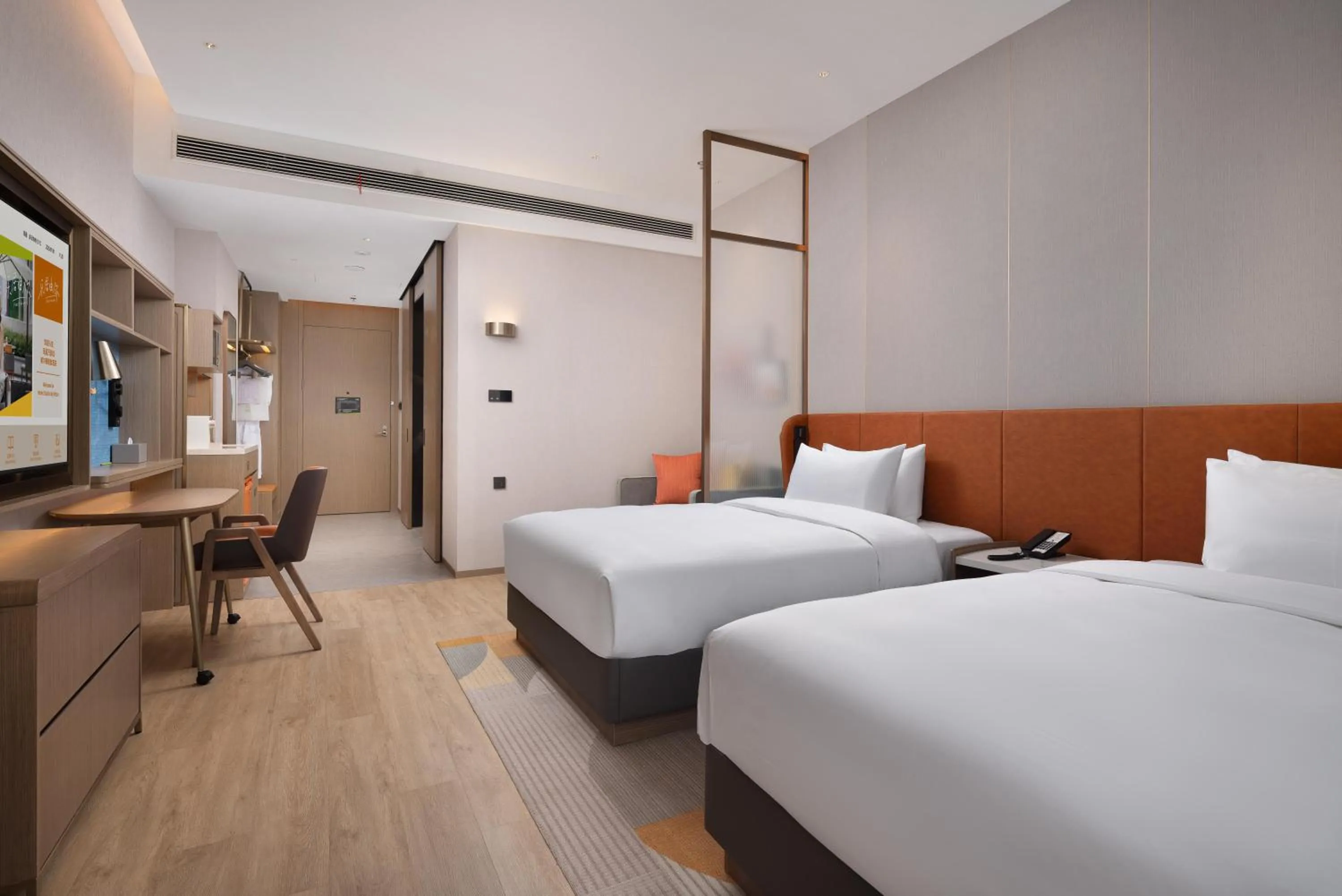 Bed in Home2 Suite by Hilton Nantong Vientiane City