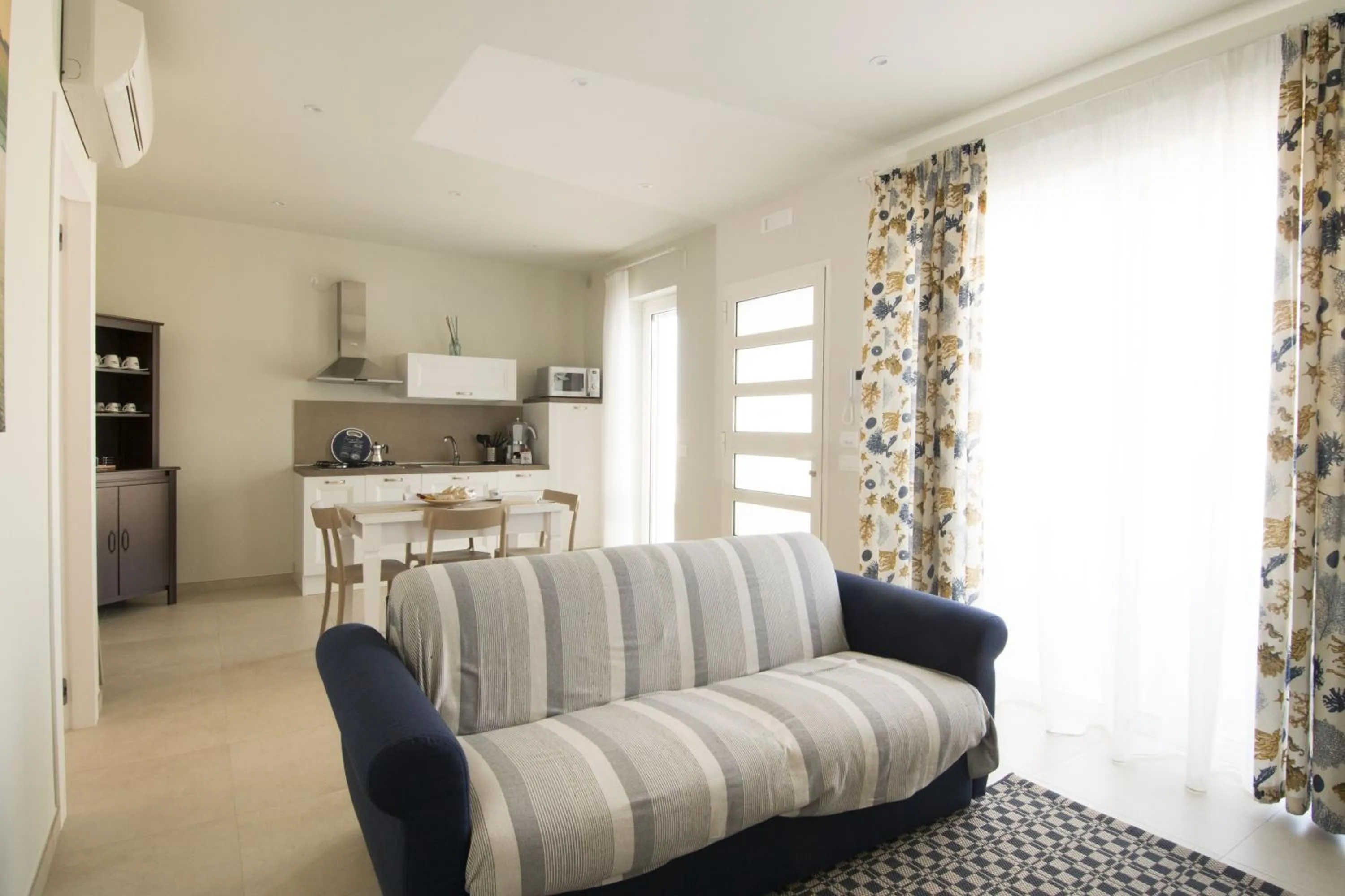 Kitchen or kitchenette in Vilu Suite Mare