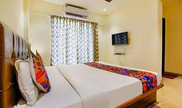 Bed in Hotel Chaitanya Executive