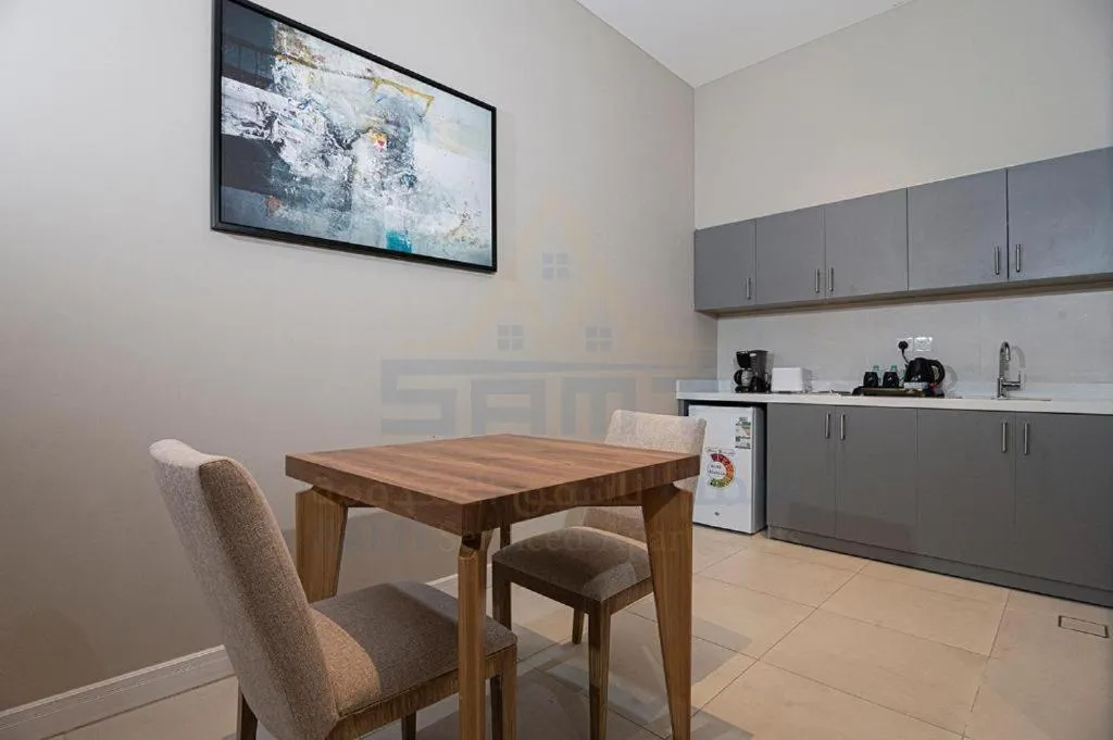 Kitchen or kitchenette in Lameek Serviced Apartments