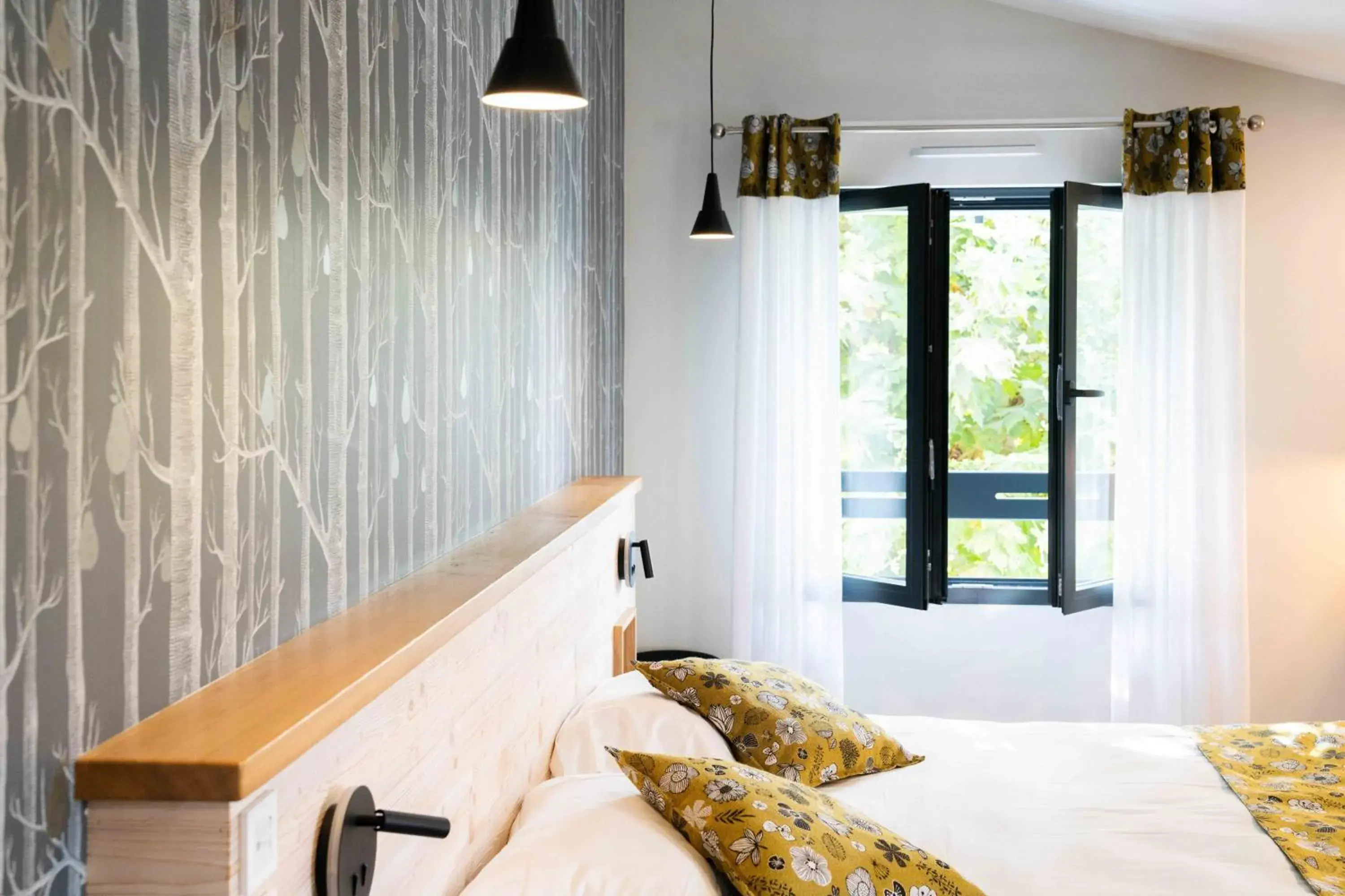 Superior Triple Room in Logis Hôtels Gnàc é Pause Superior Triple Room in Logis Hôtels Gnàc é Pause