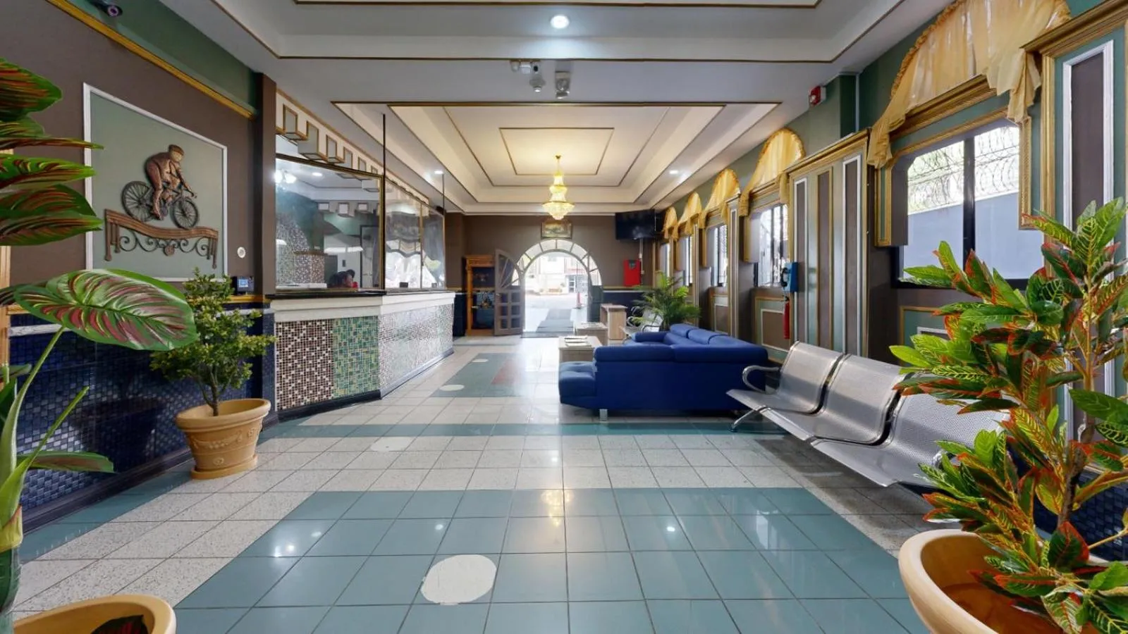 Lobby or reception in Regency Suites Hotel