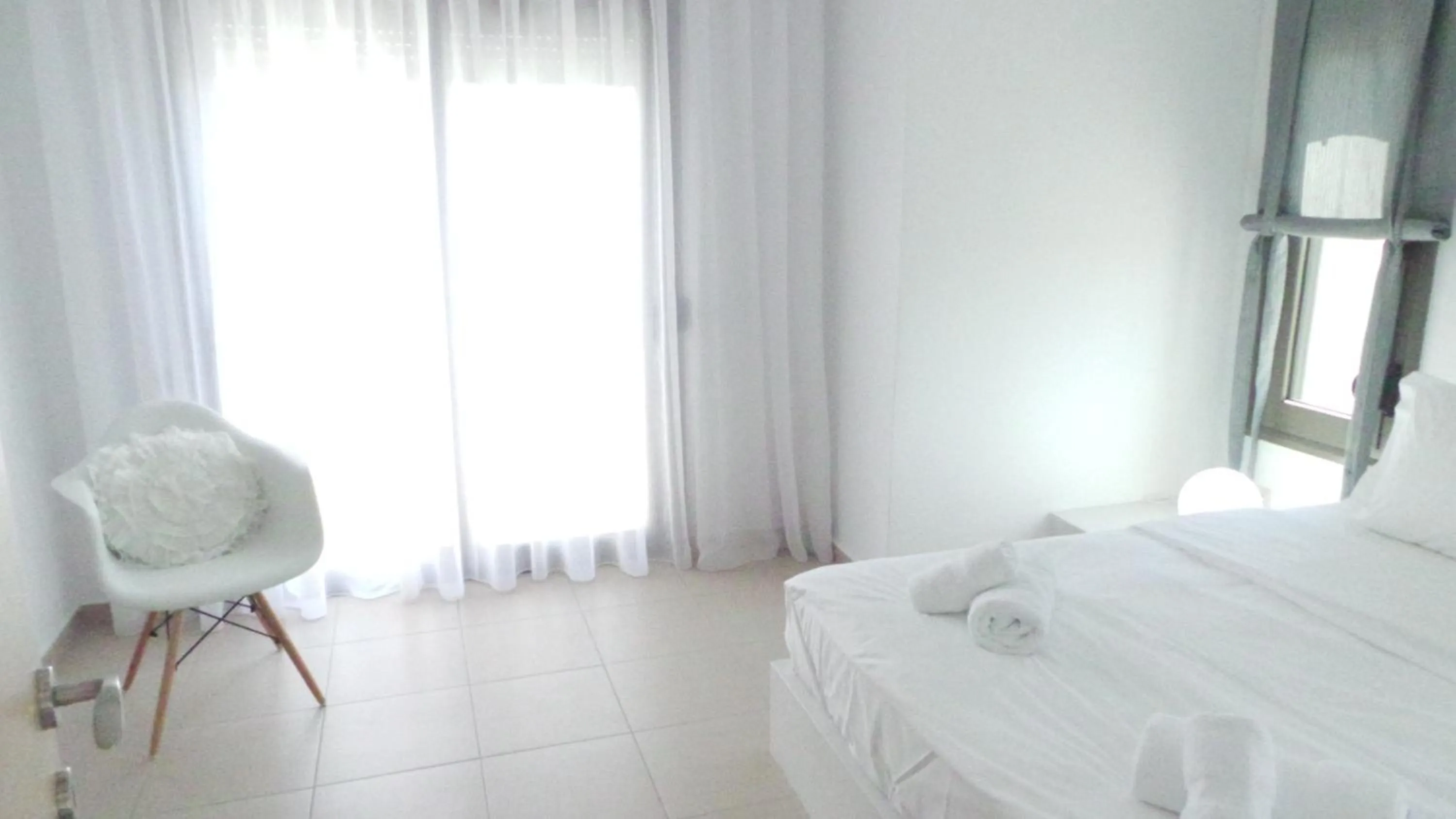 Bed in Niovi Boutique Apartments