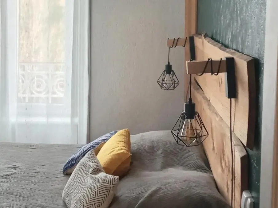 Bed in Le Relais De Rochepaule