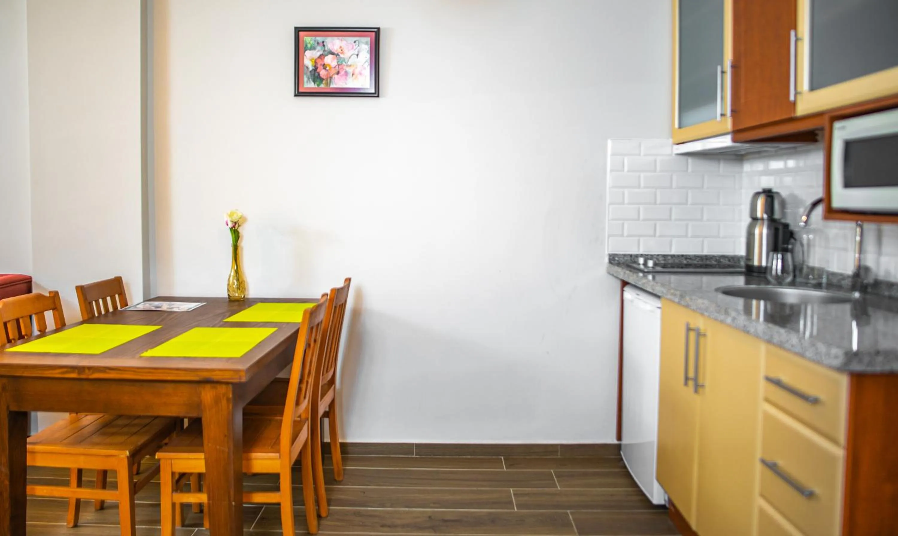 Kitchen or kitchenette in Dores Residence