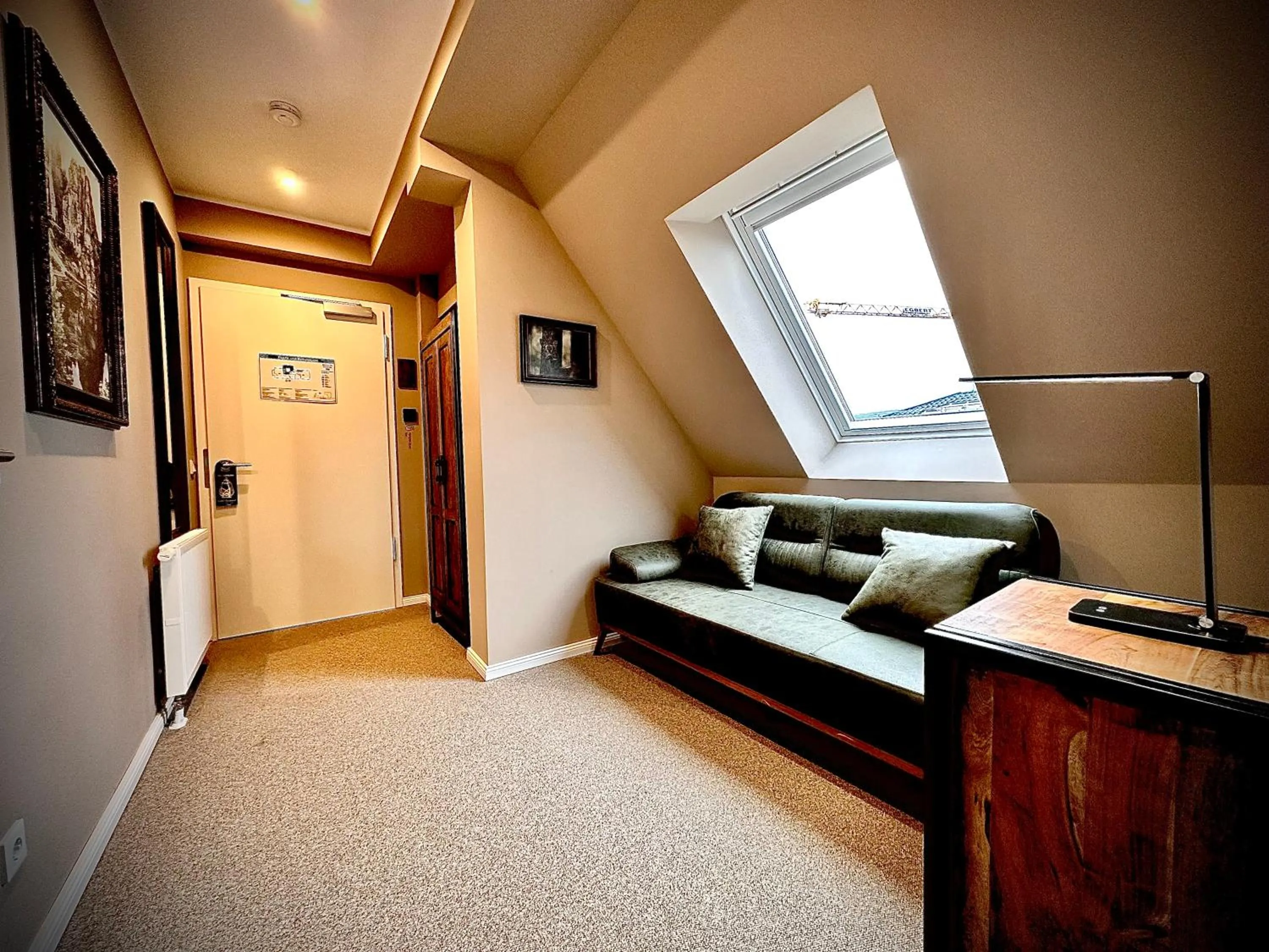 Seating area, Bed in Privathotel Riesenbeck