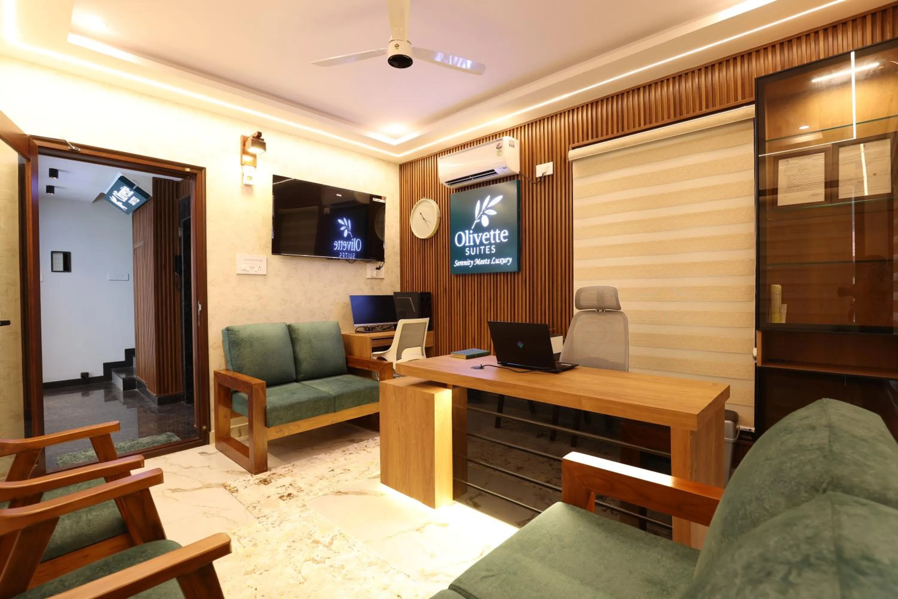 Seating area in Olivette Suites