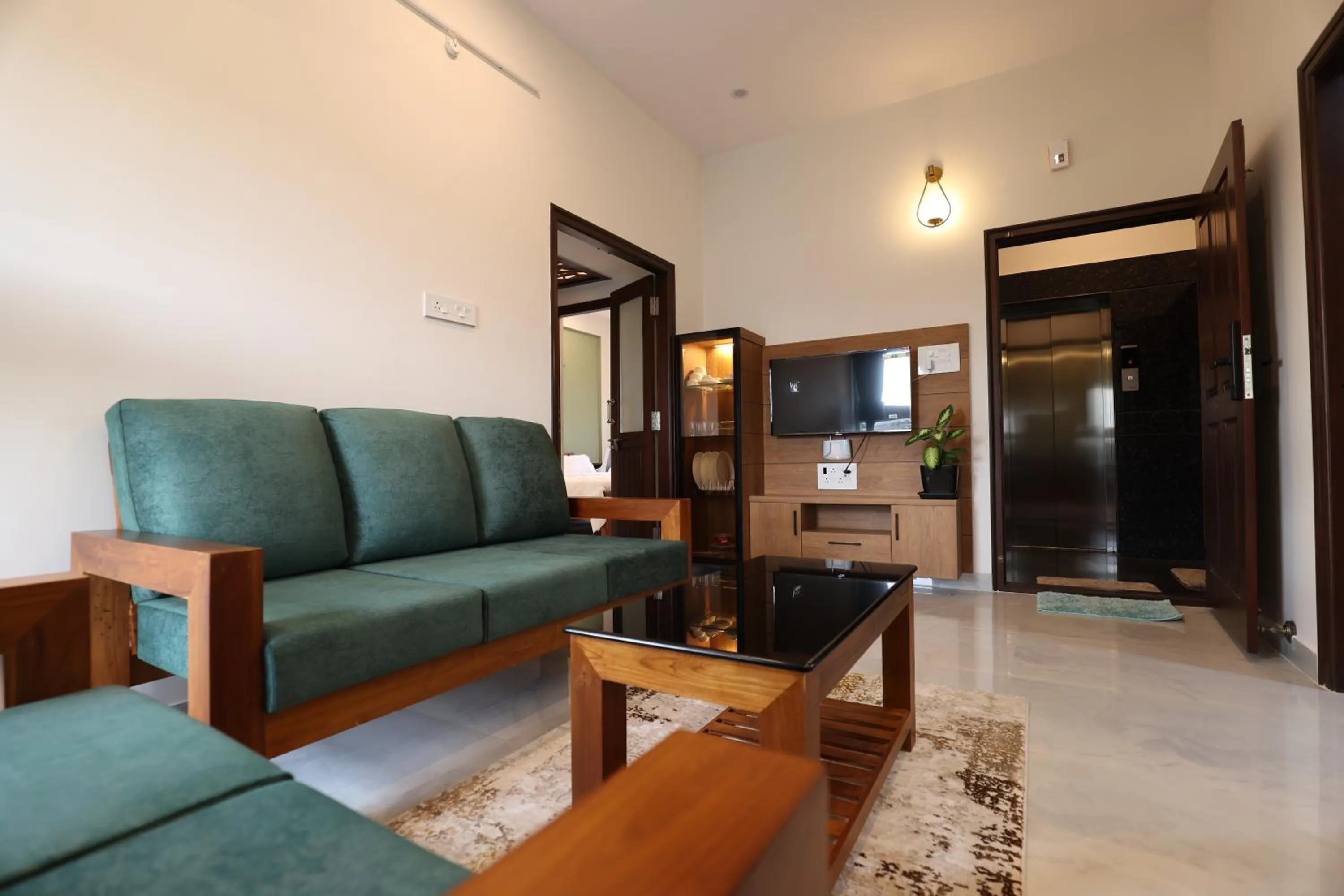 Seating area in Olivette Suites