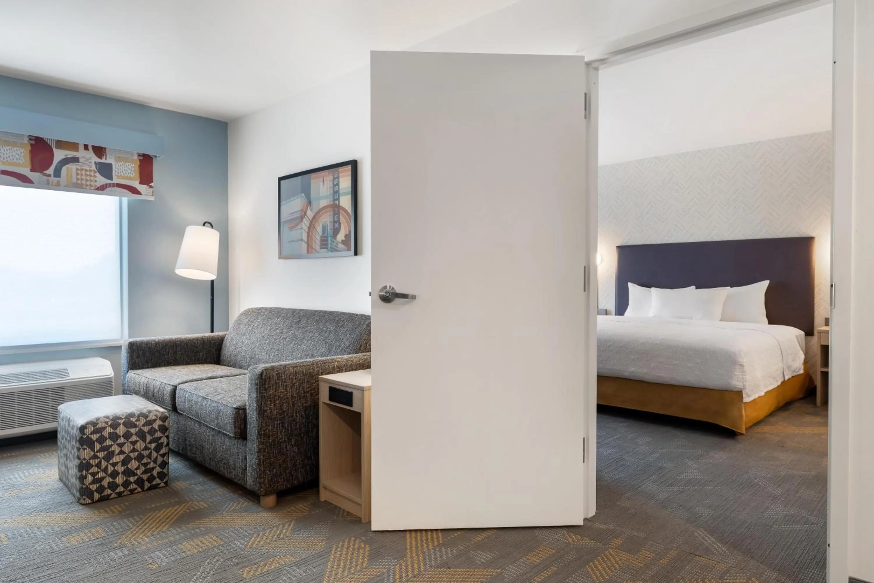 Living room, Bed in Home2 Suites By Hilton New Braunfels