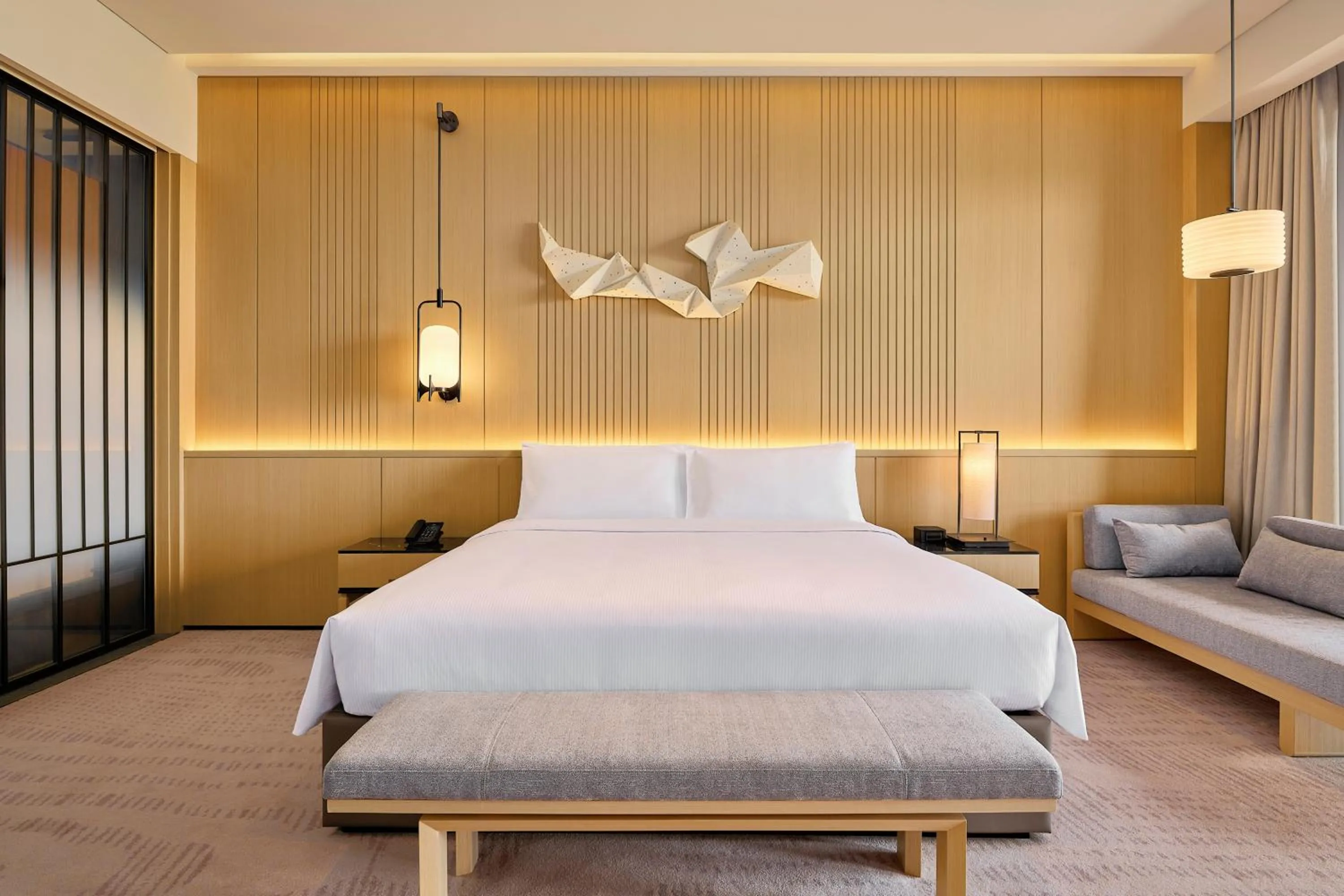 Bed in Secan Hotel Qingdao, Curio Collection By Hilton