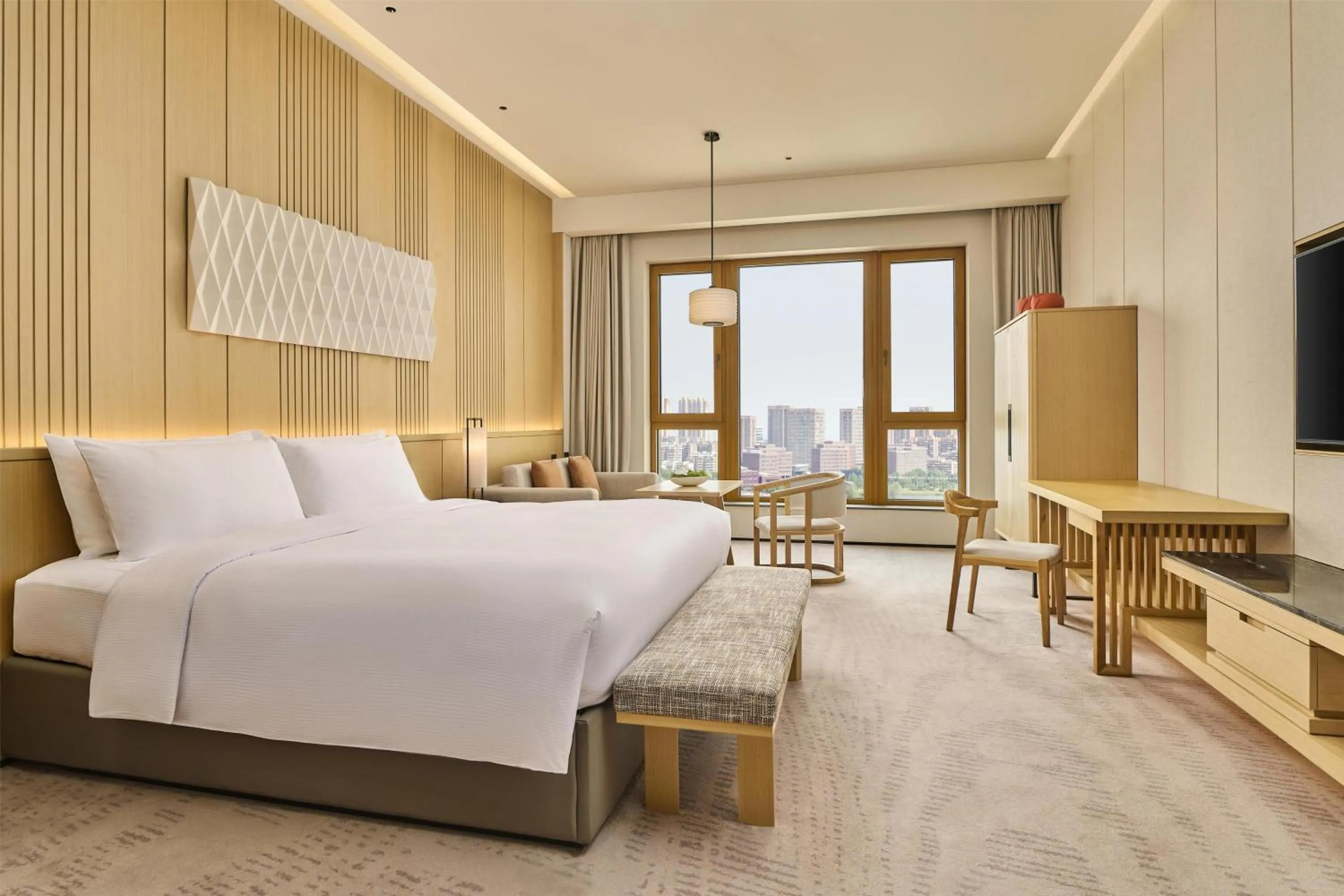 Bed in Secan Hotel Qingdao, Curio Collection By Hilton