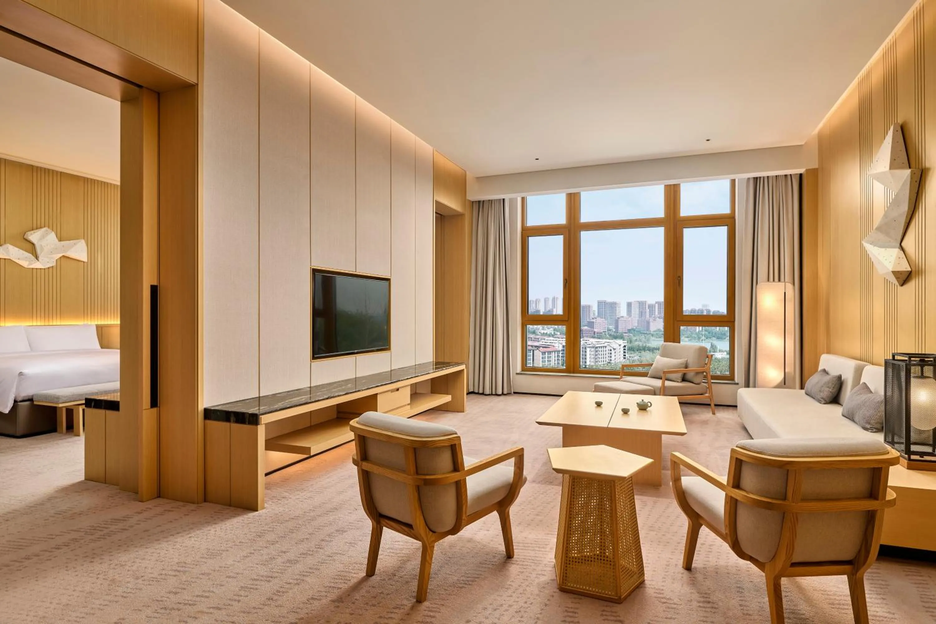 Living room, Bed in Secan Hotel Qingdao, Curio Collection By Hilton