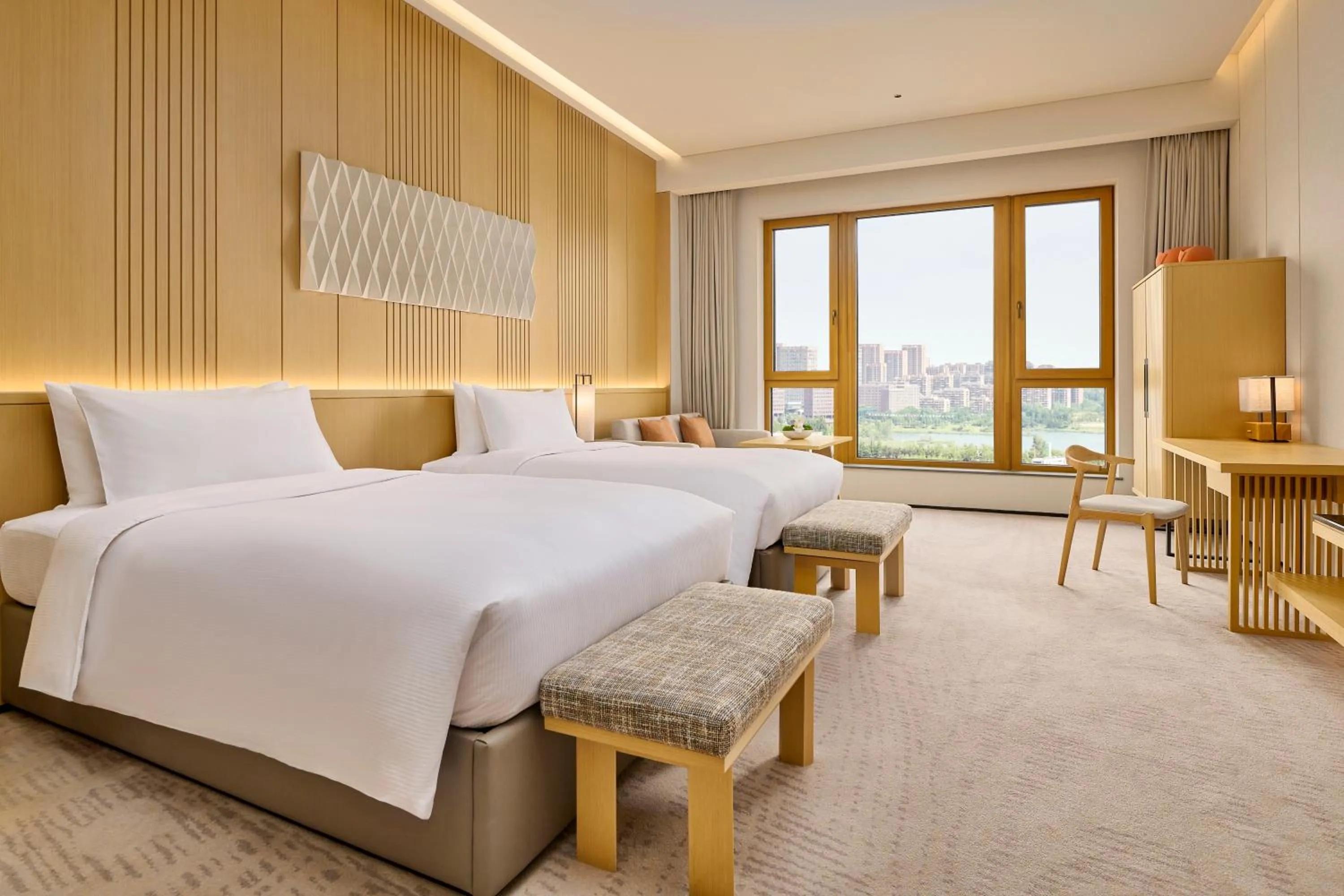 Bed in Secan Hotel Qingdao, Curio Collection By Hilton