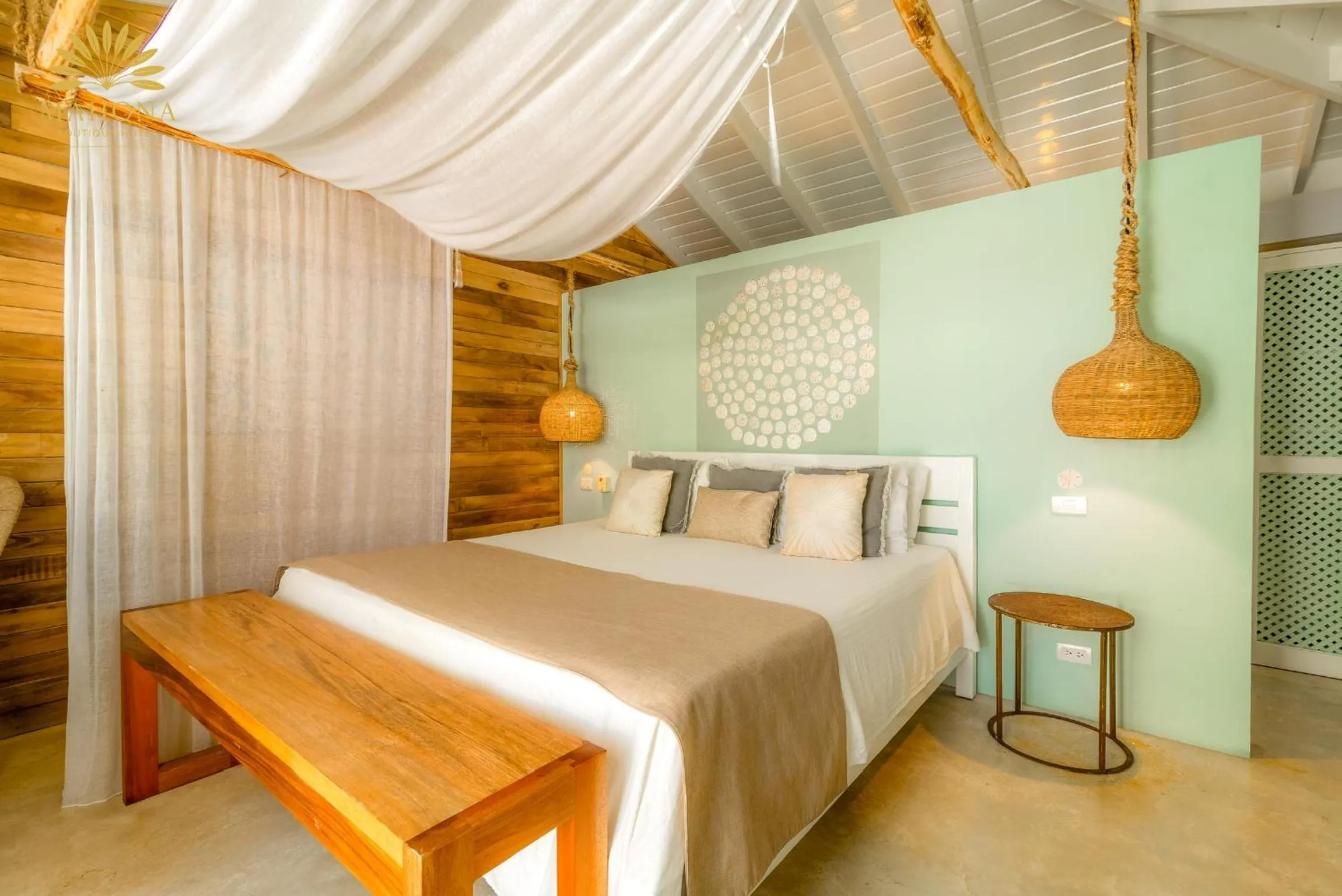 Bed in Mahona Boutique Hotel