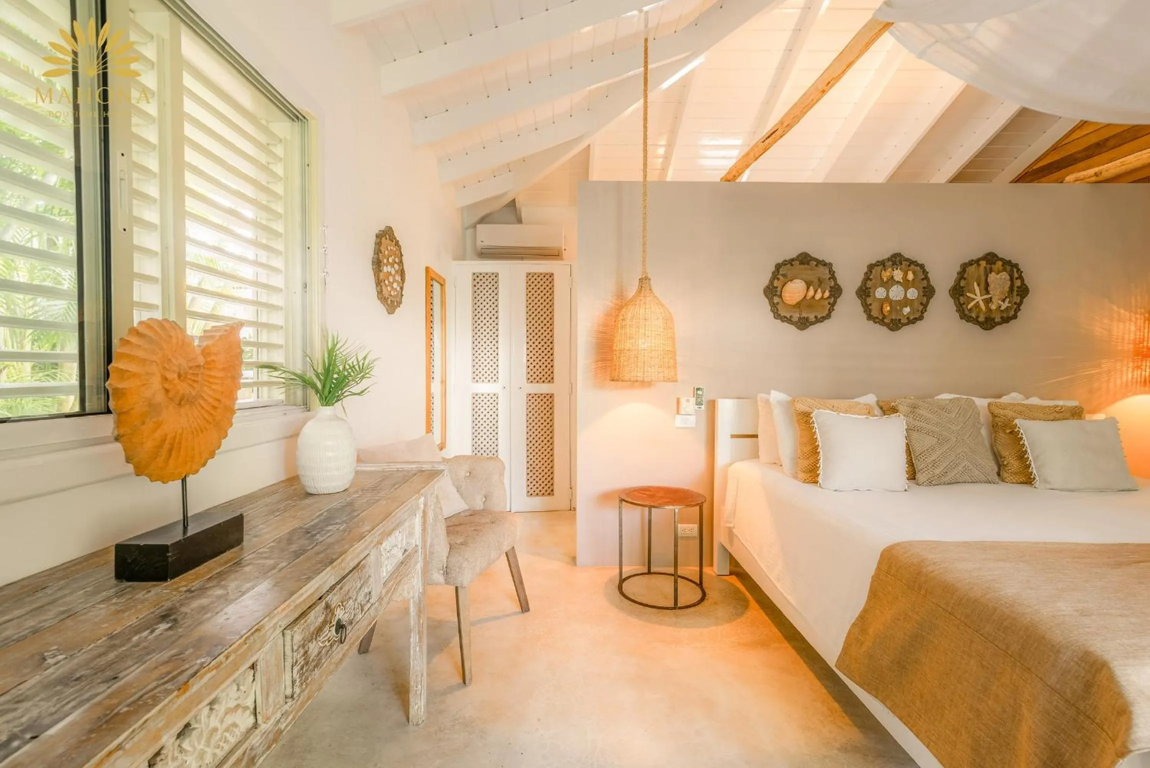 Bed in Mahona Boutique Hotel