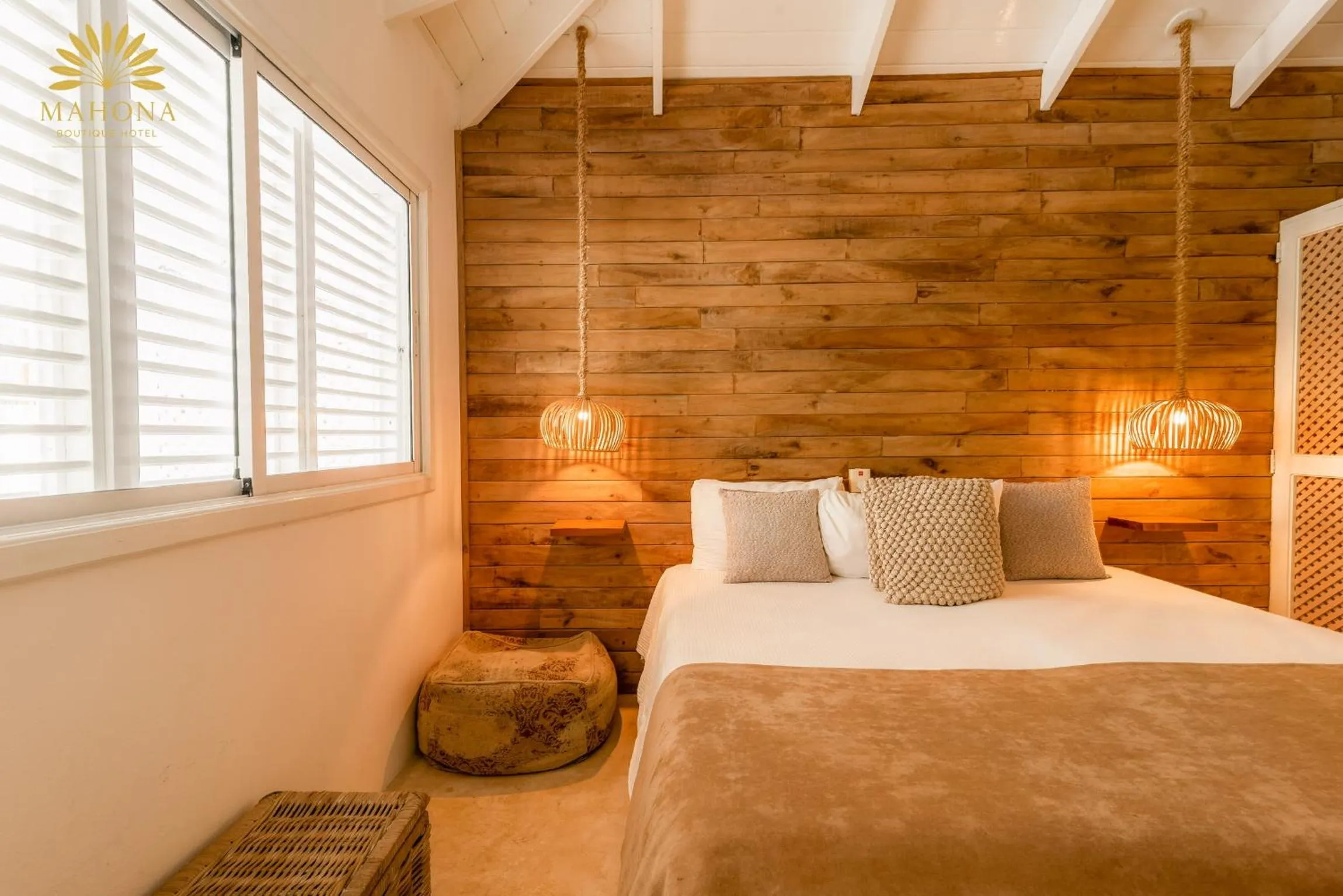 Bed in Mahona Boutique Hotel