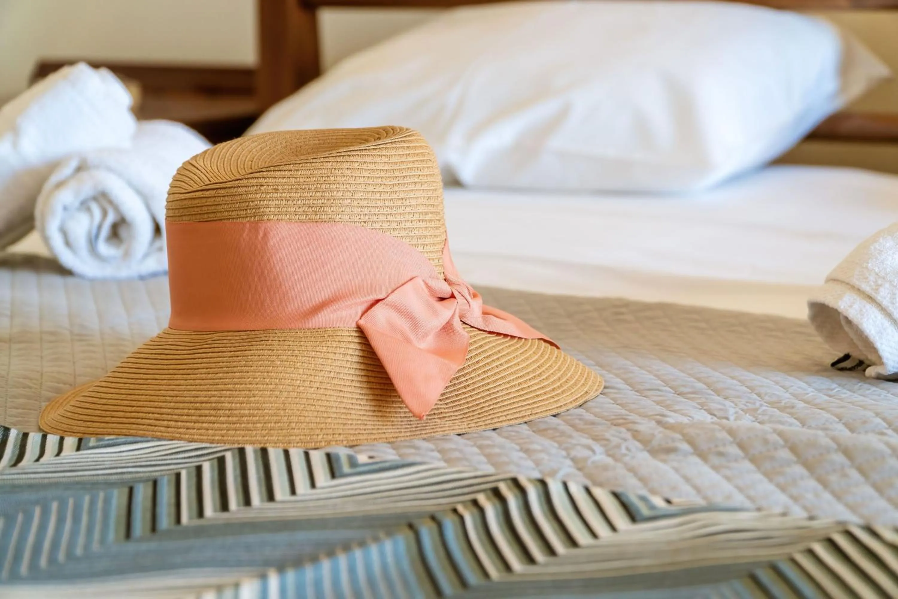 Bed in Sunrise Suites & Apartments