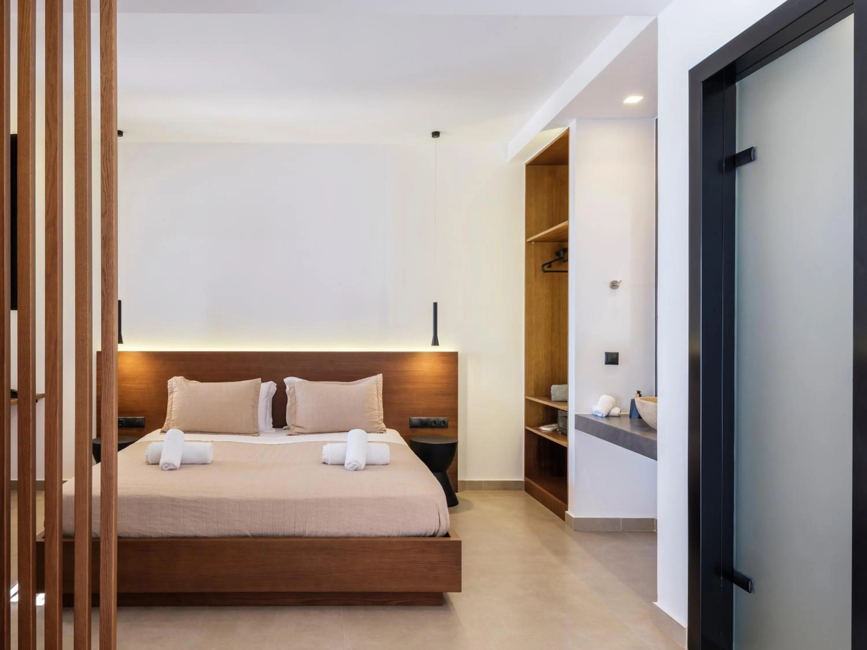 Bed in Evi Suites & Villas