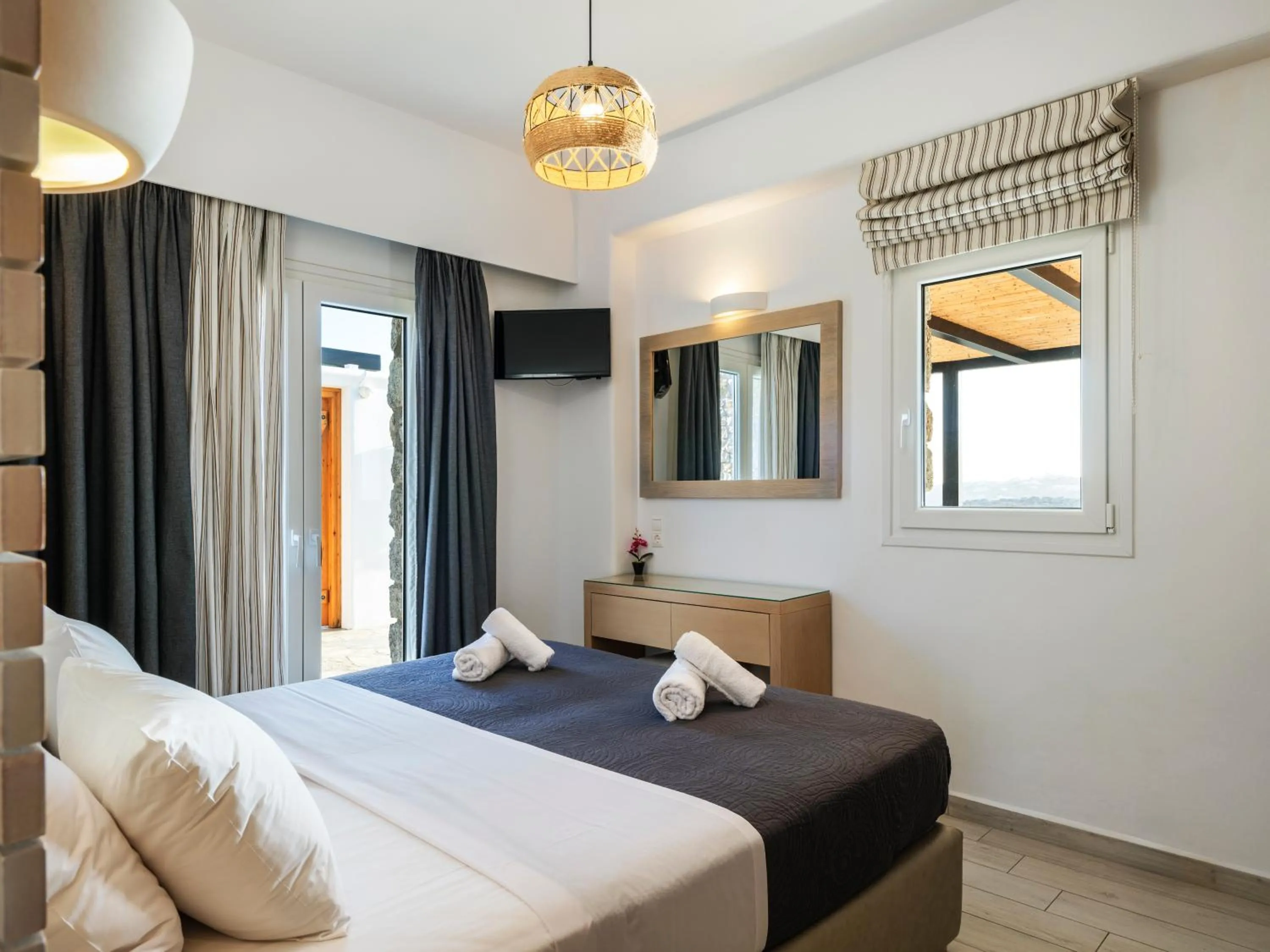 Bed in Evi Suites & Villas