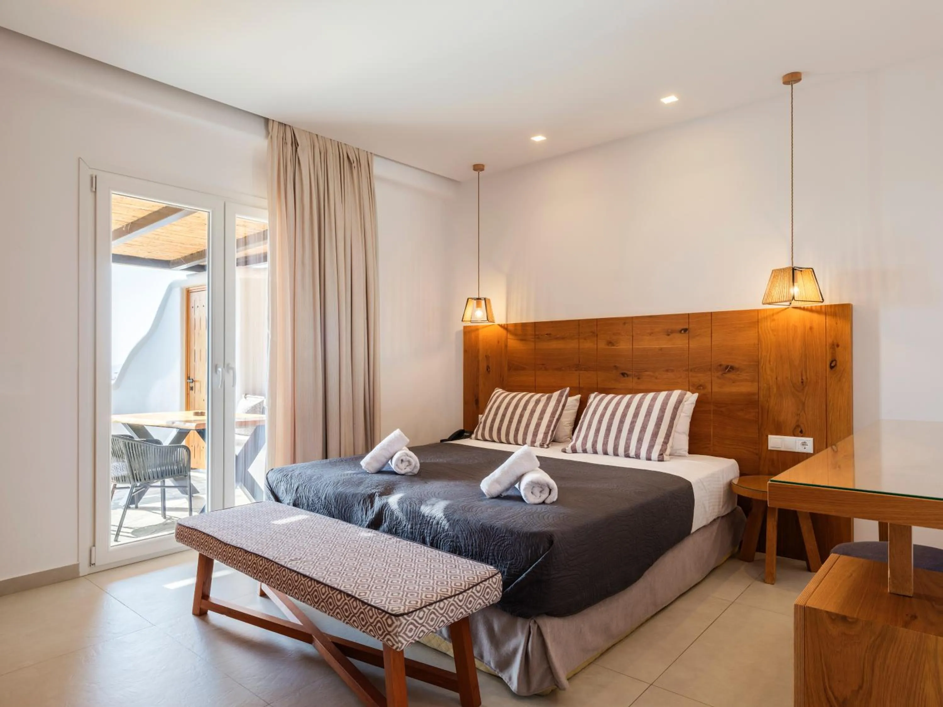 Bed in Evi Suites & Villas