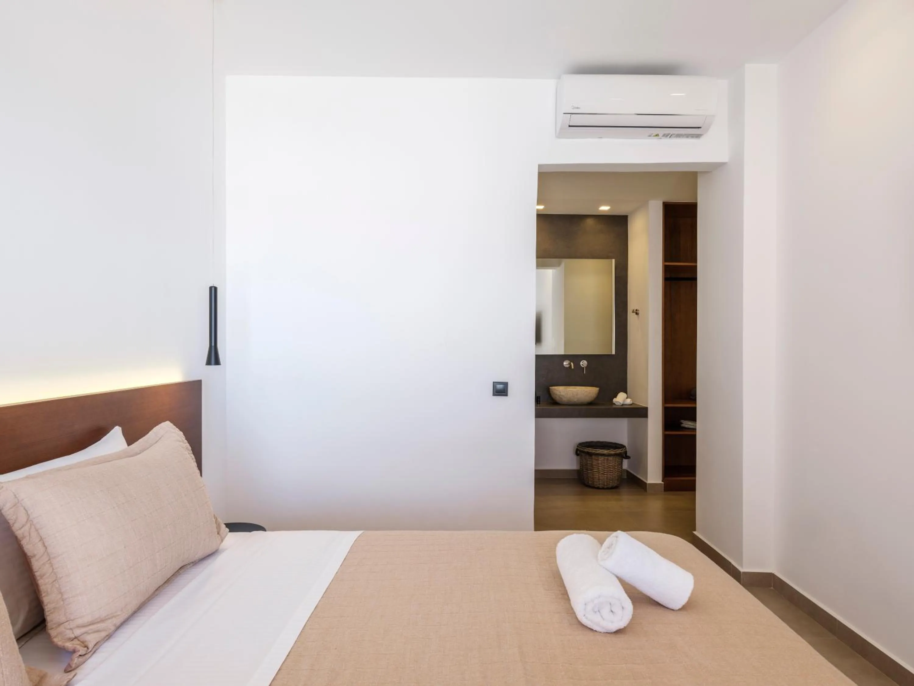 Bed in Evi Suites & Villas