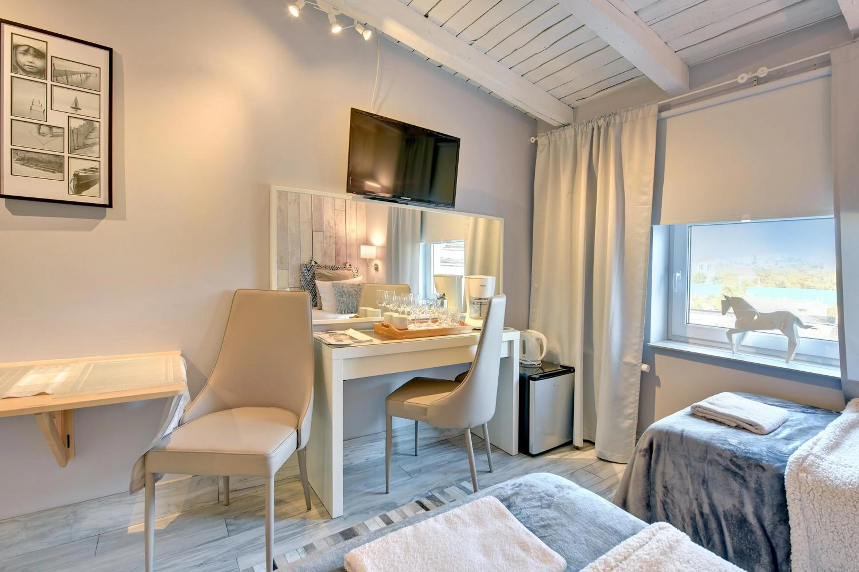 Photo of the whole room in Kamienica Gdynia hotelowe komfortowe łóżka, plaża Orłowo molo