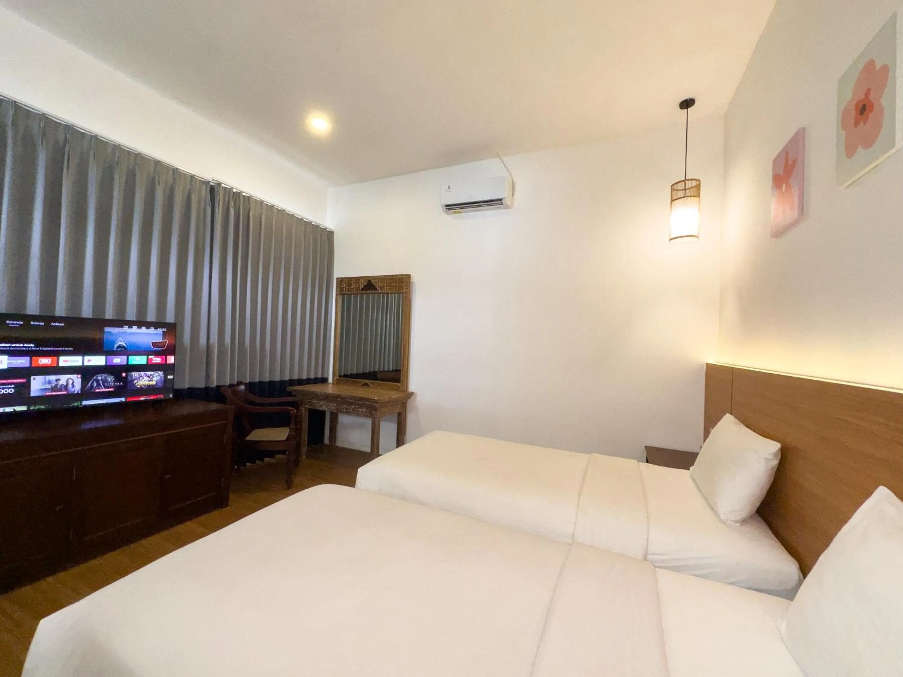 Bed in Casa de Lani Resort & Convention