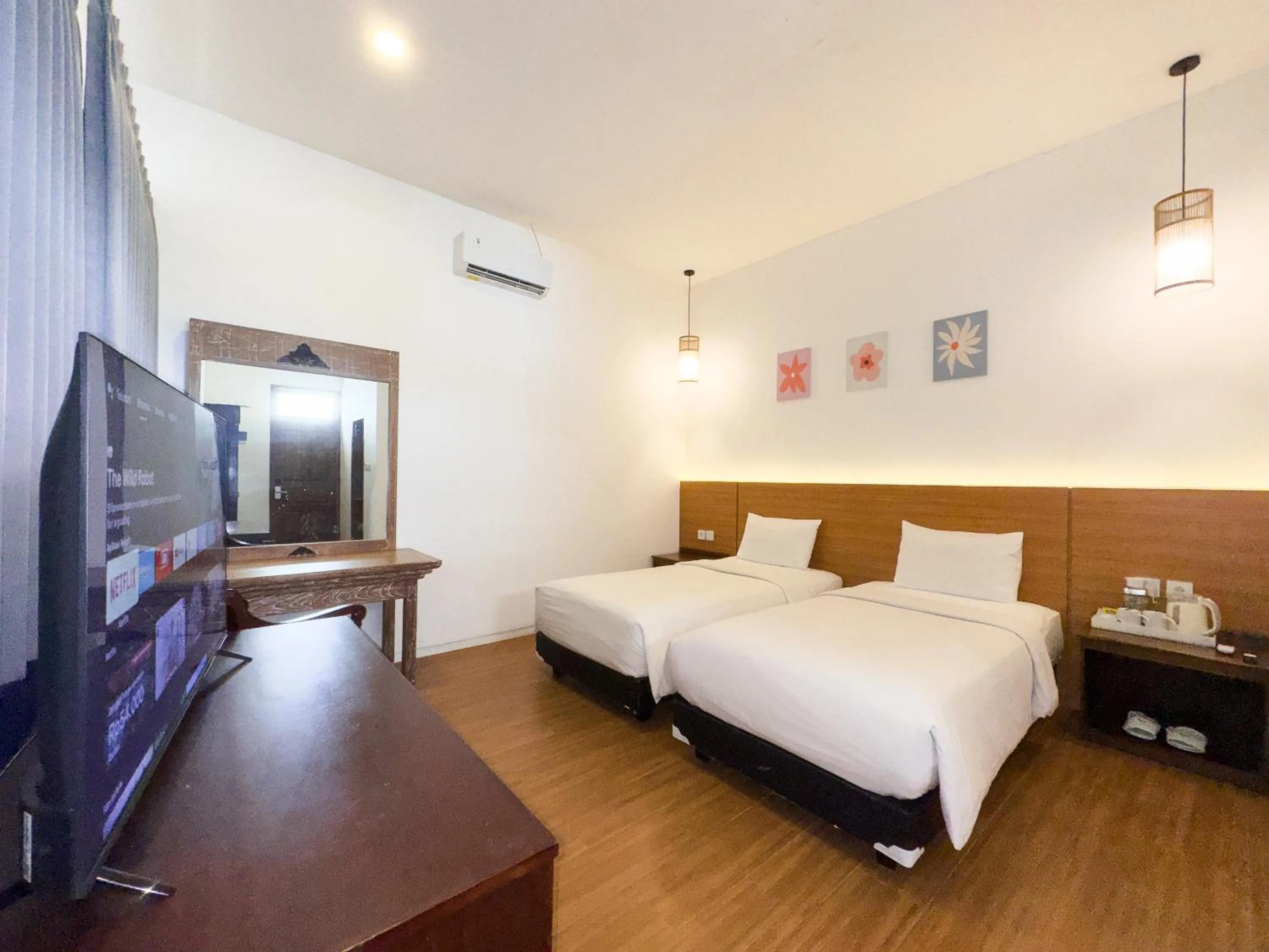 Bed in Casa de Lani Resort & Convention