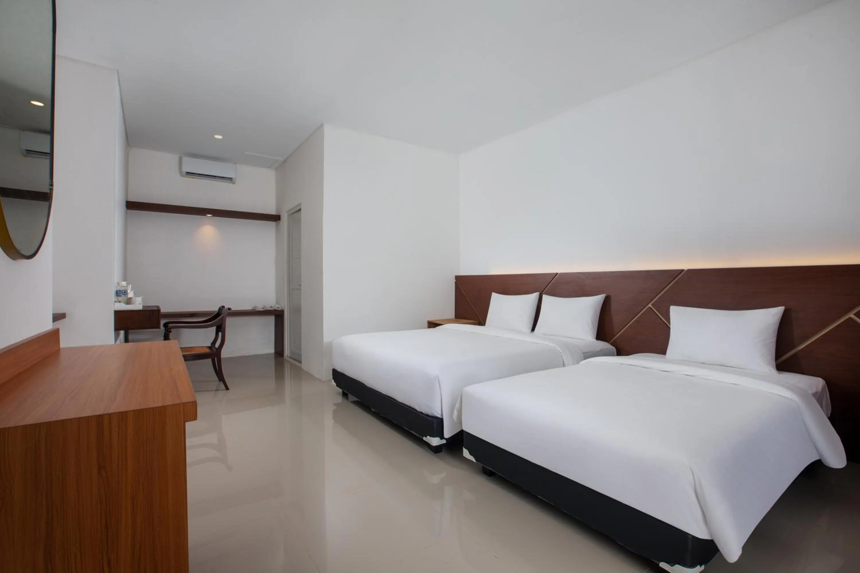 Bed in Casa de Lani Resort & Convention