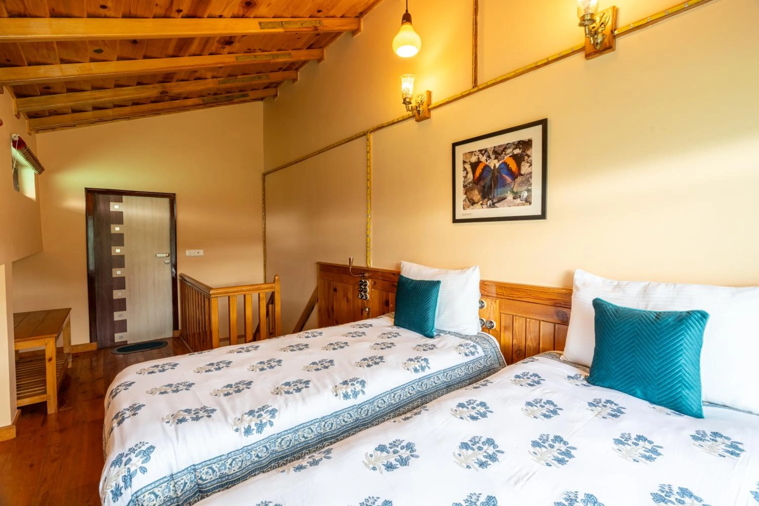 Bed in Parvada Bungalows