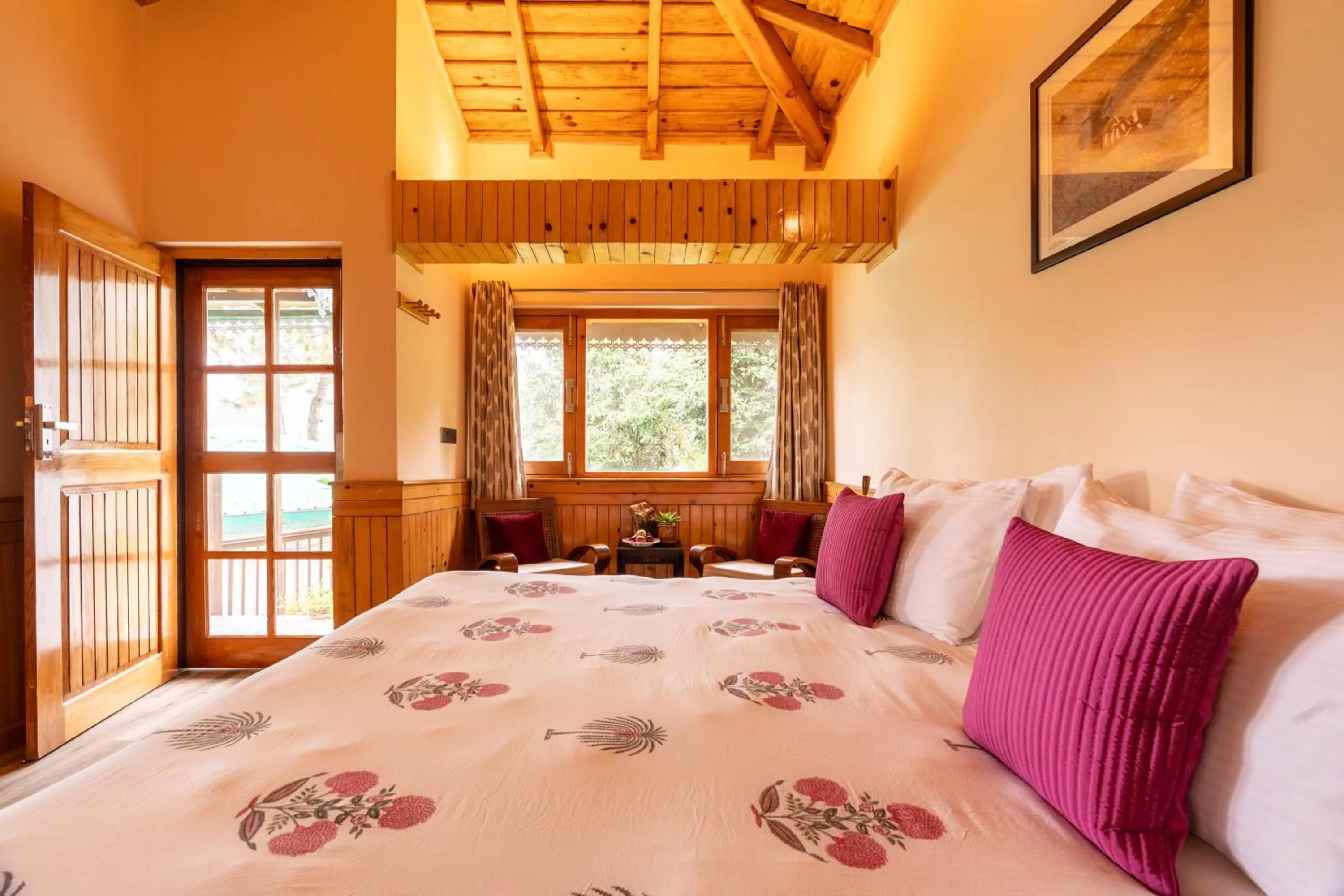 Bed in Parvada Bungalows