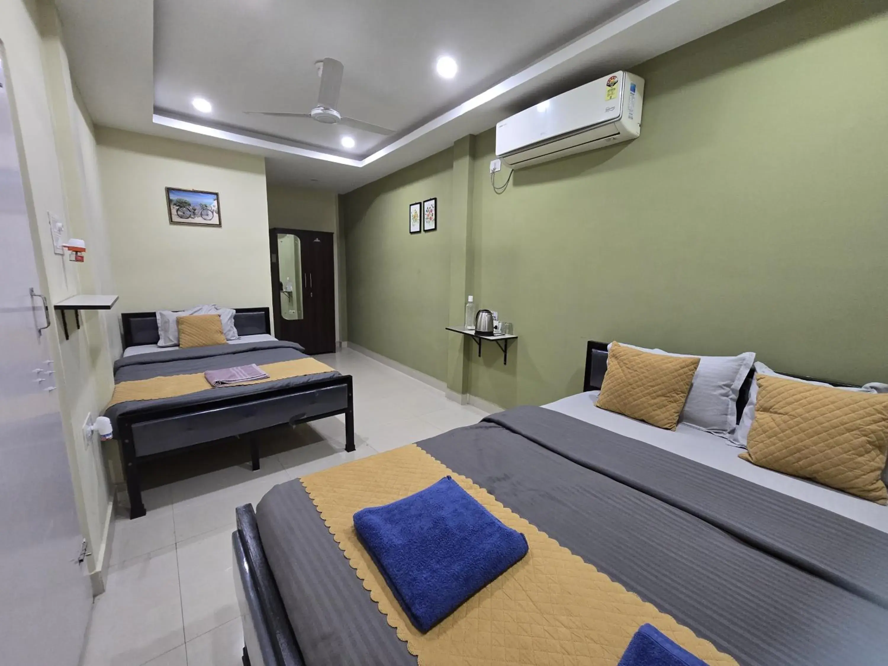 Deluxe Family Room in The Gulmohar Inn Six Mile Guwahati Assam Deluxe Family Room in The Gulmohar Inn Six Mile Guwahati Assam