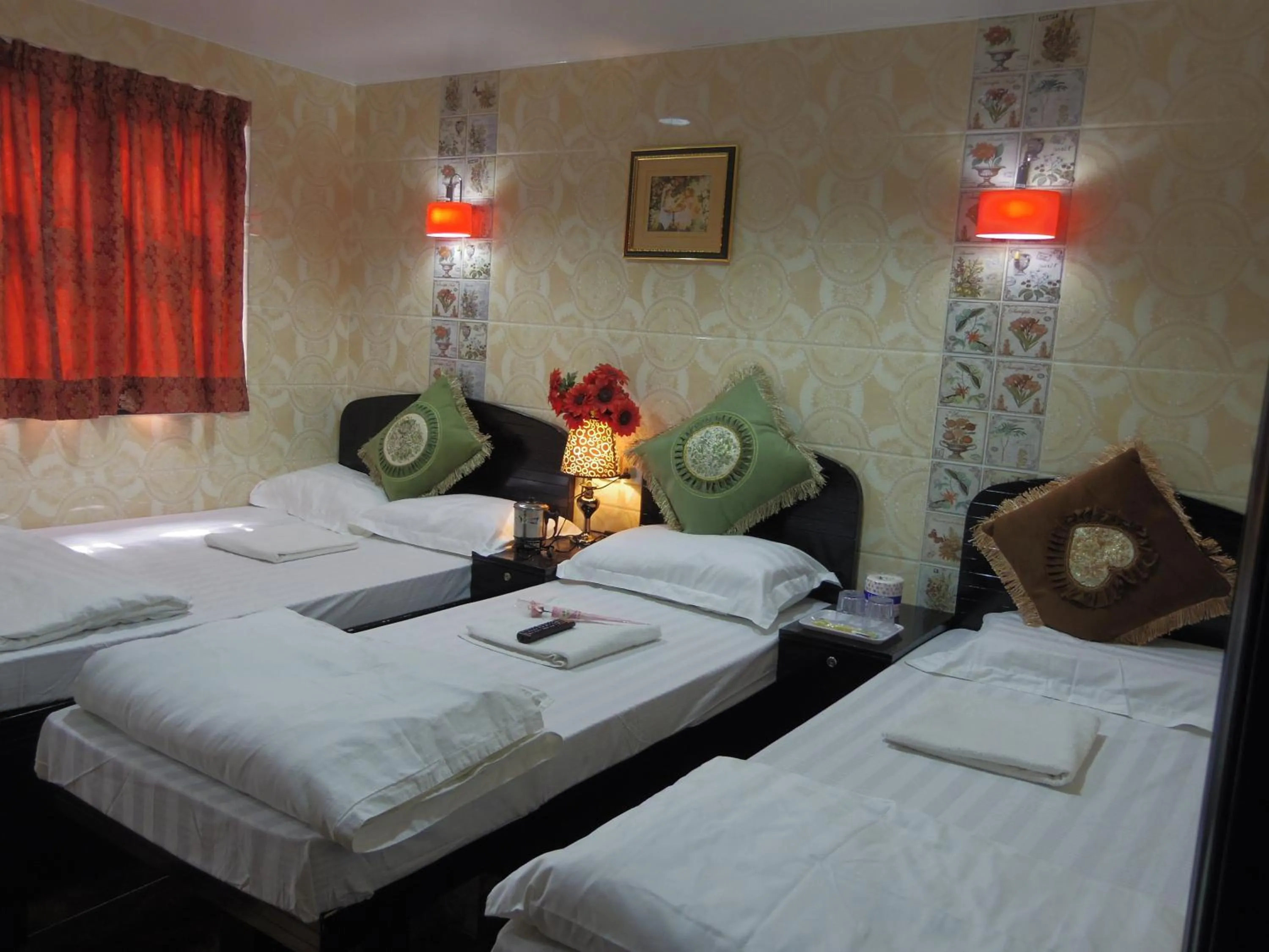 Photo of the whole room, Bed in Mabuhay Hotel