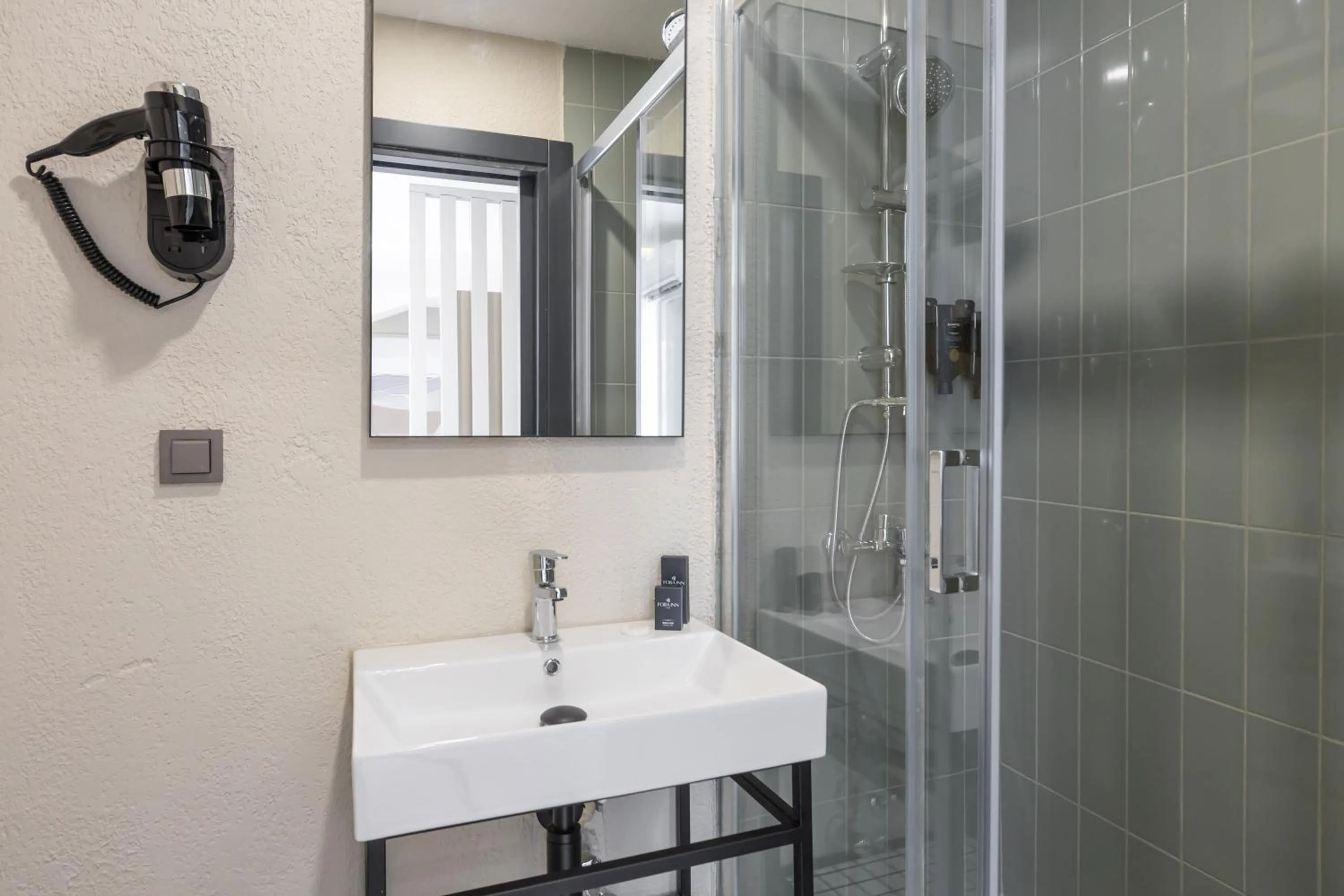 Bathroom in Fora Inn Lara