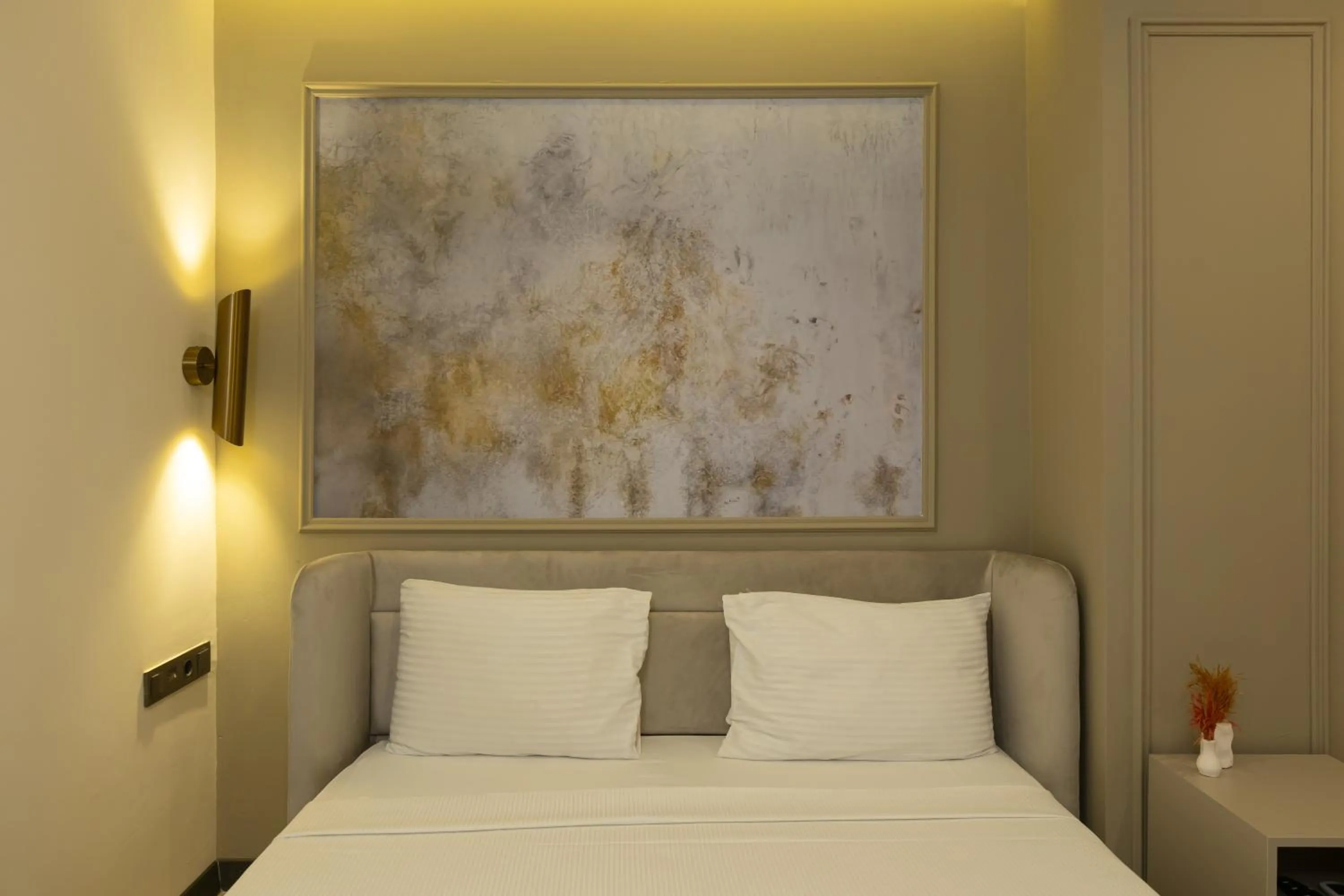 Bed in Fora Inn Lara