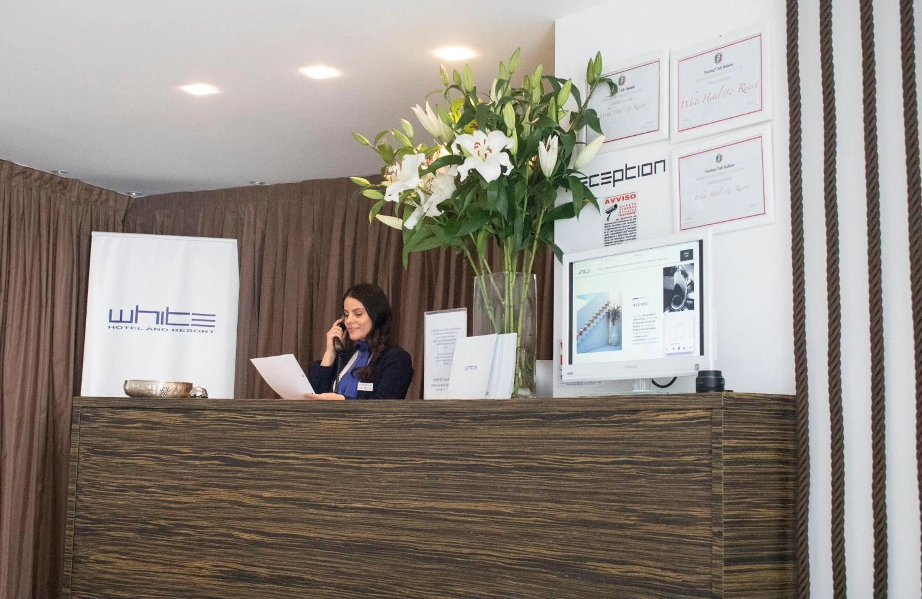 Staff in White Hotel