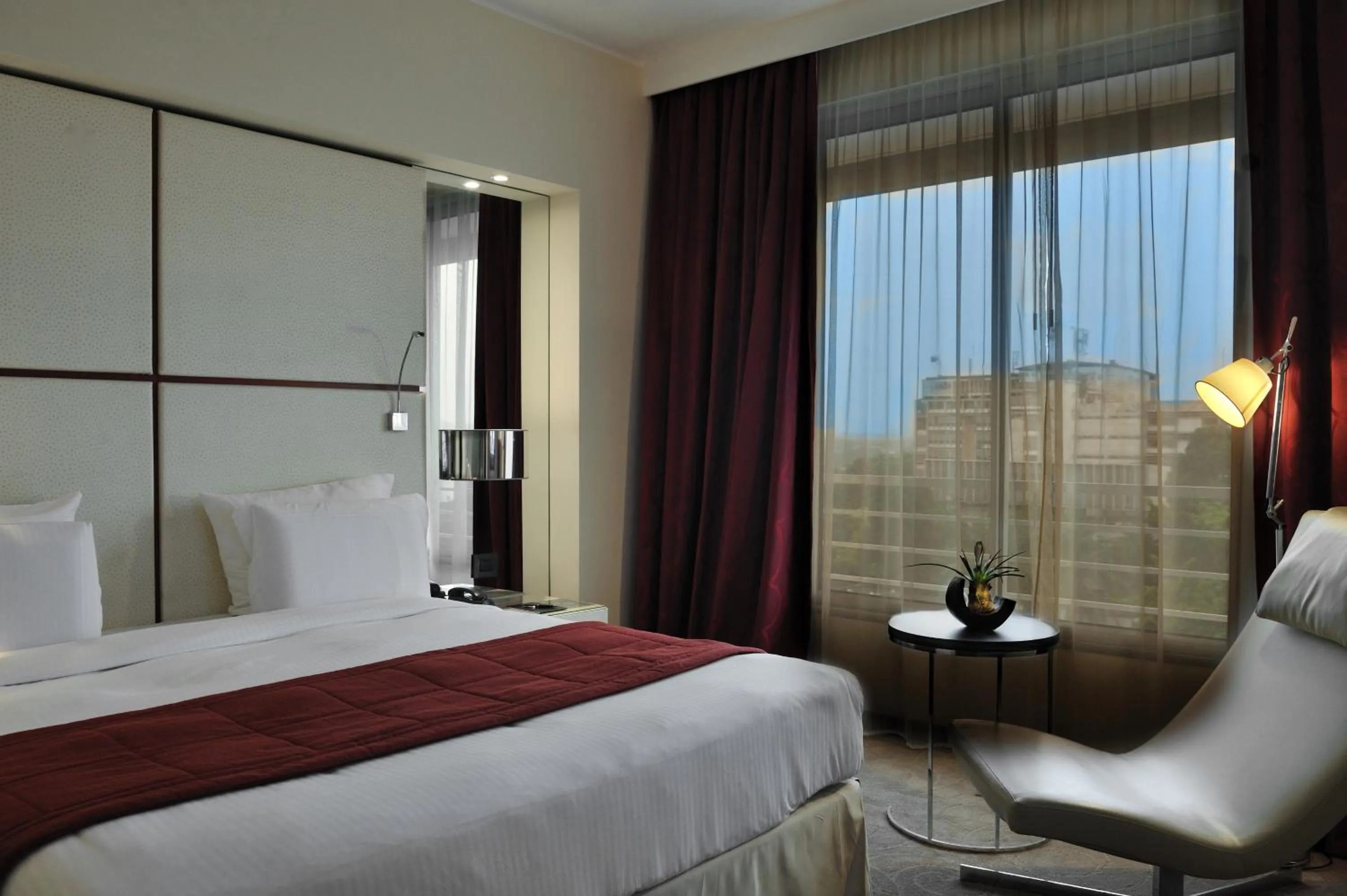 Photo of the whole room, Bed in Pullman Kinshasa Grand Hotel