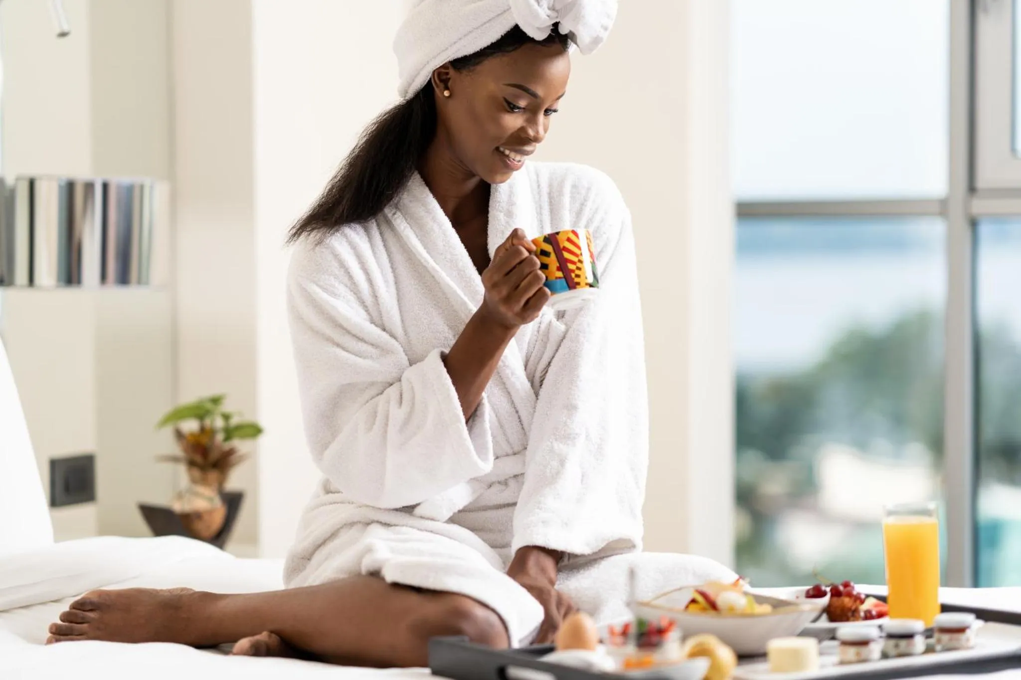 Bed in Pullman Kinshasa Grand Hotel