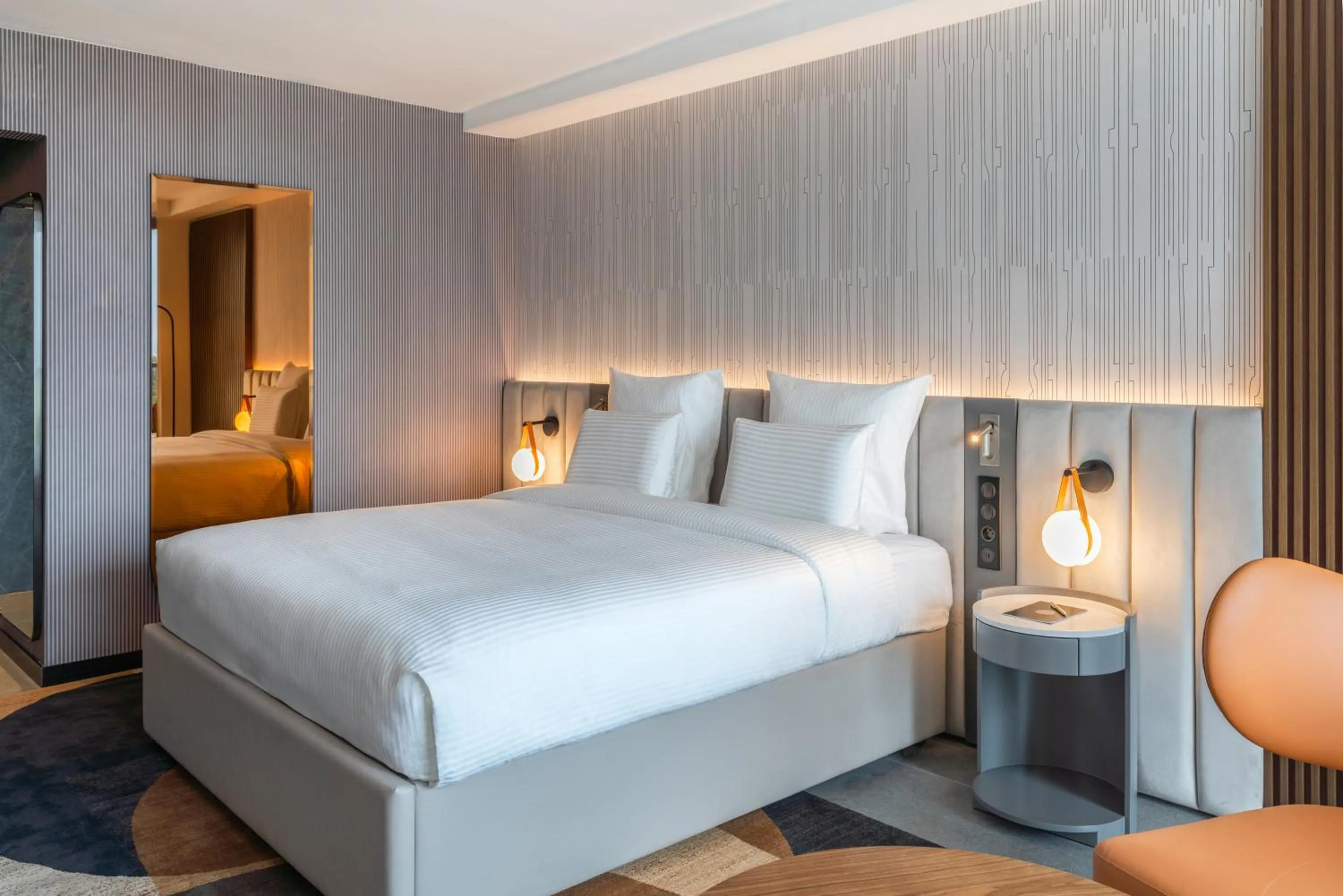 Bed in Pullman Kinshasa Grand Hotel