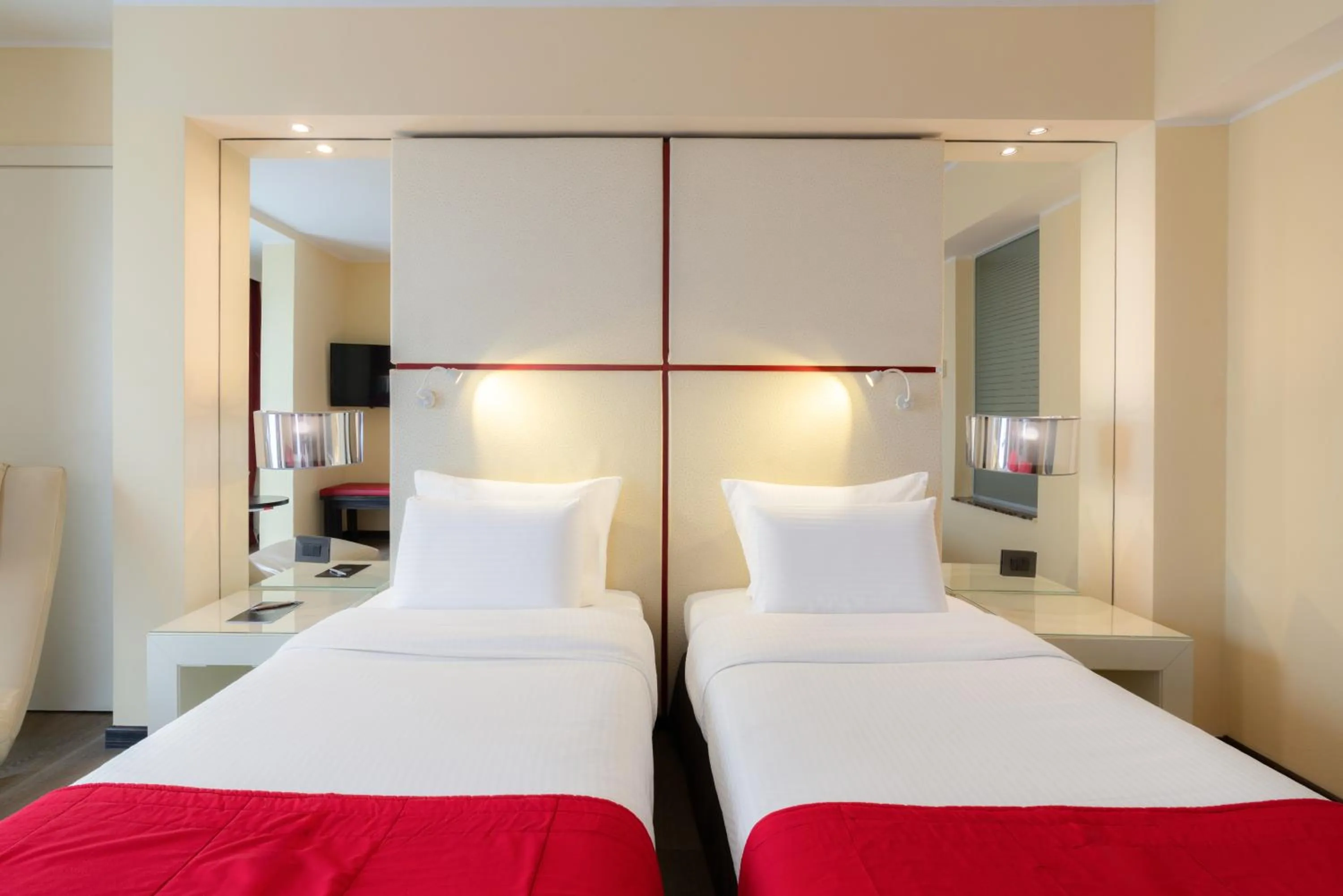 Bed in Pullman Kinshasa Grand Hotel