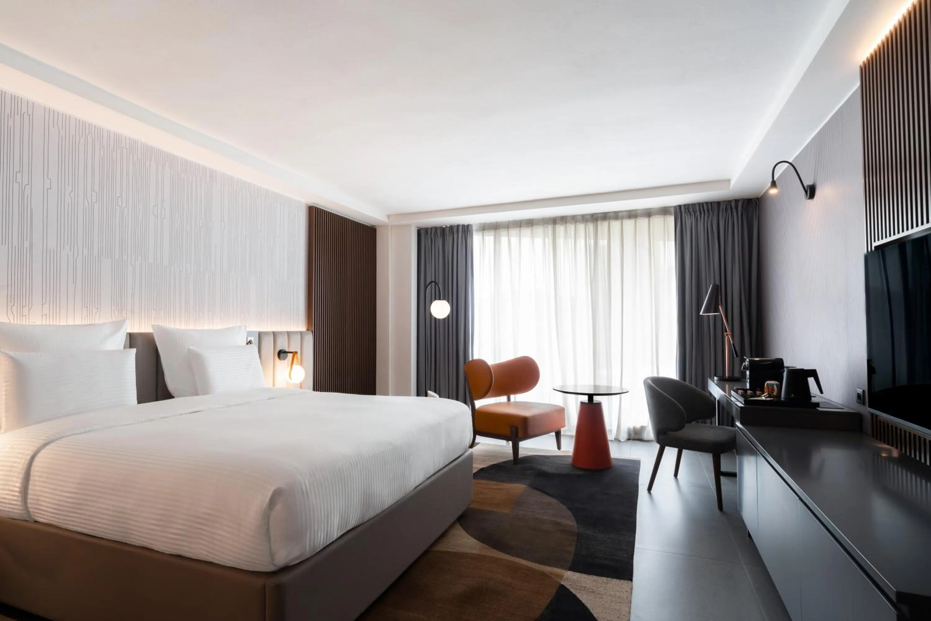 Photo of the whole room, Bed in Pullman Kinshasa Grand Hotel