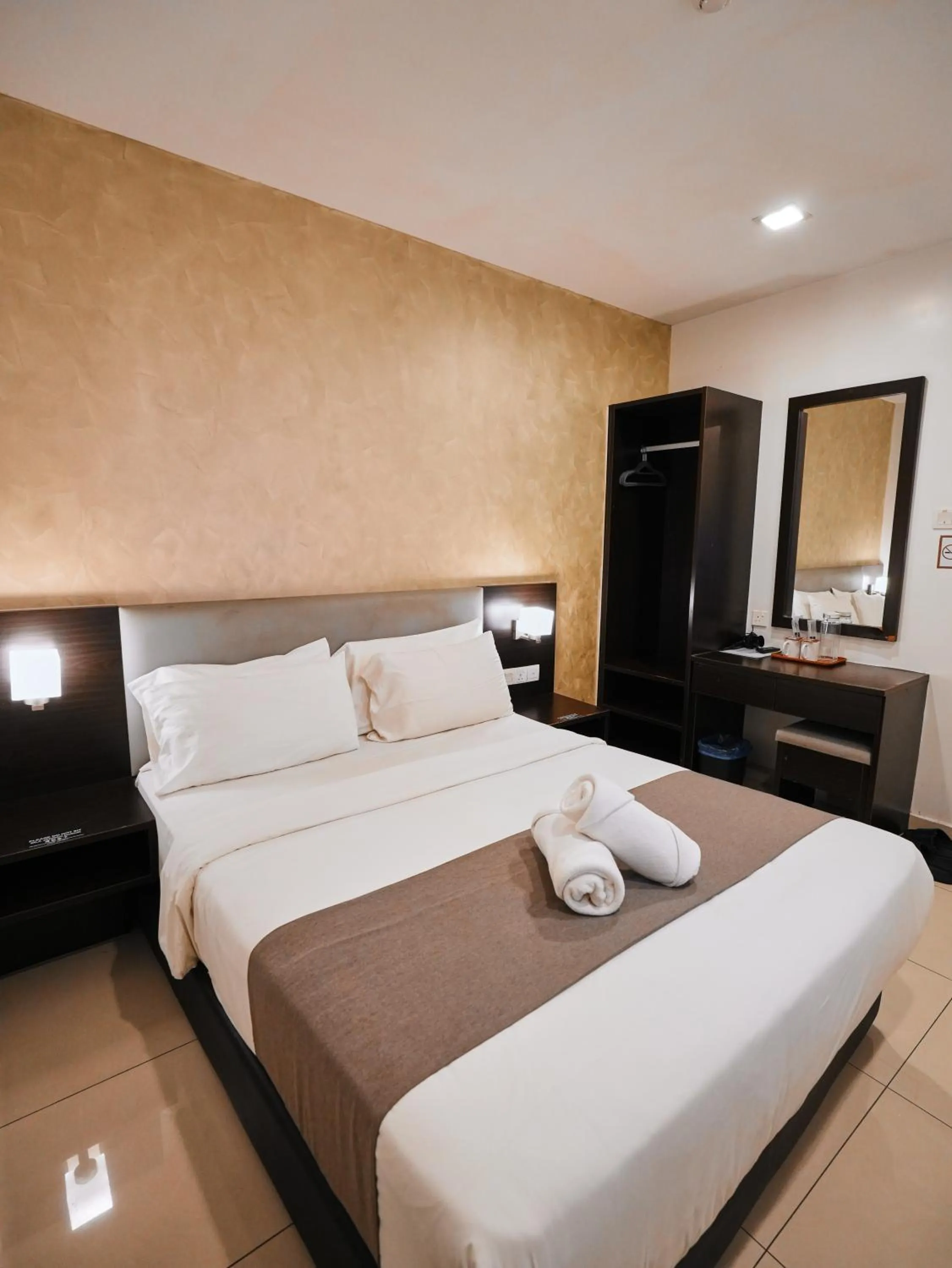 Bed in Eco Roomy Hotel