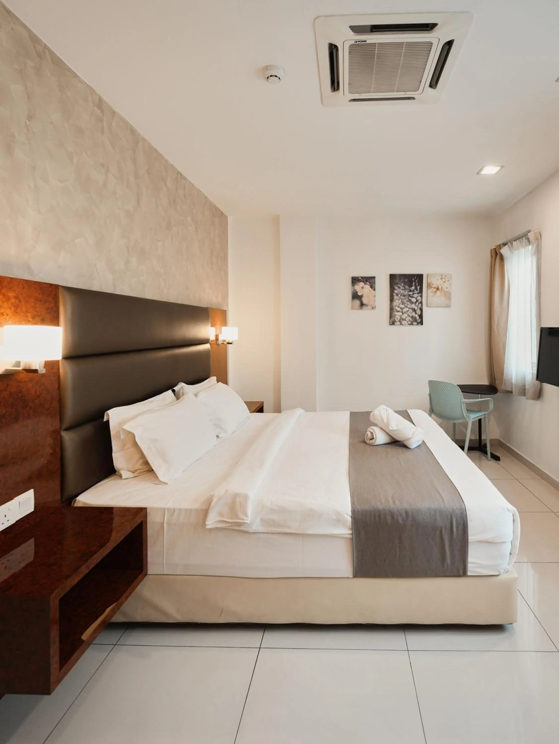 Bed in Eco Roomy Hotel