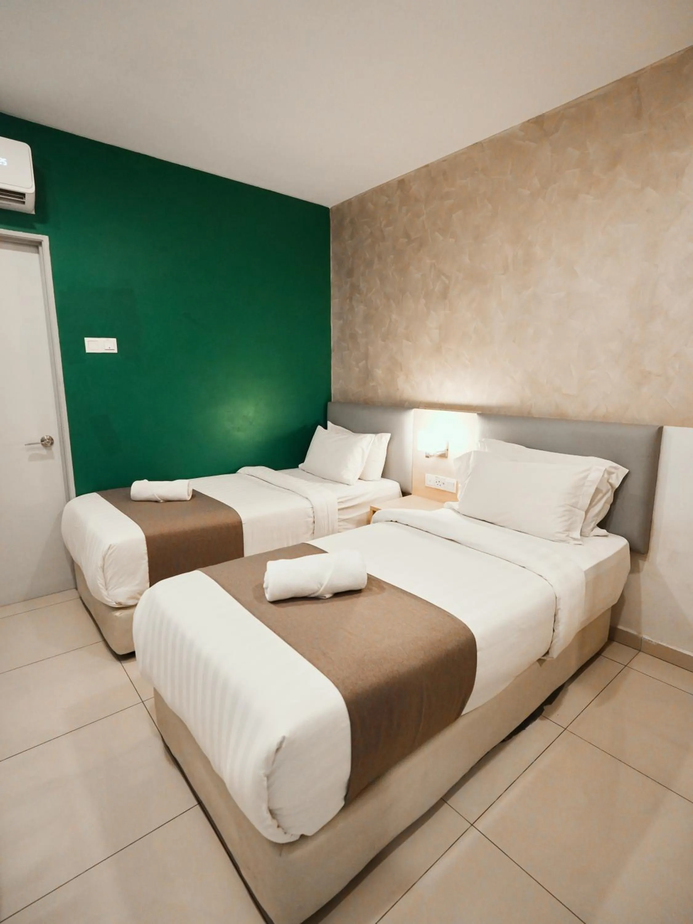 Bed in Eco Roomy Hotel