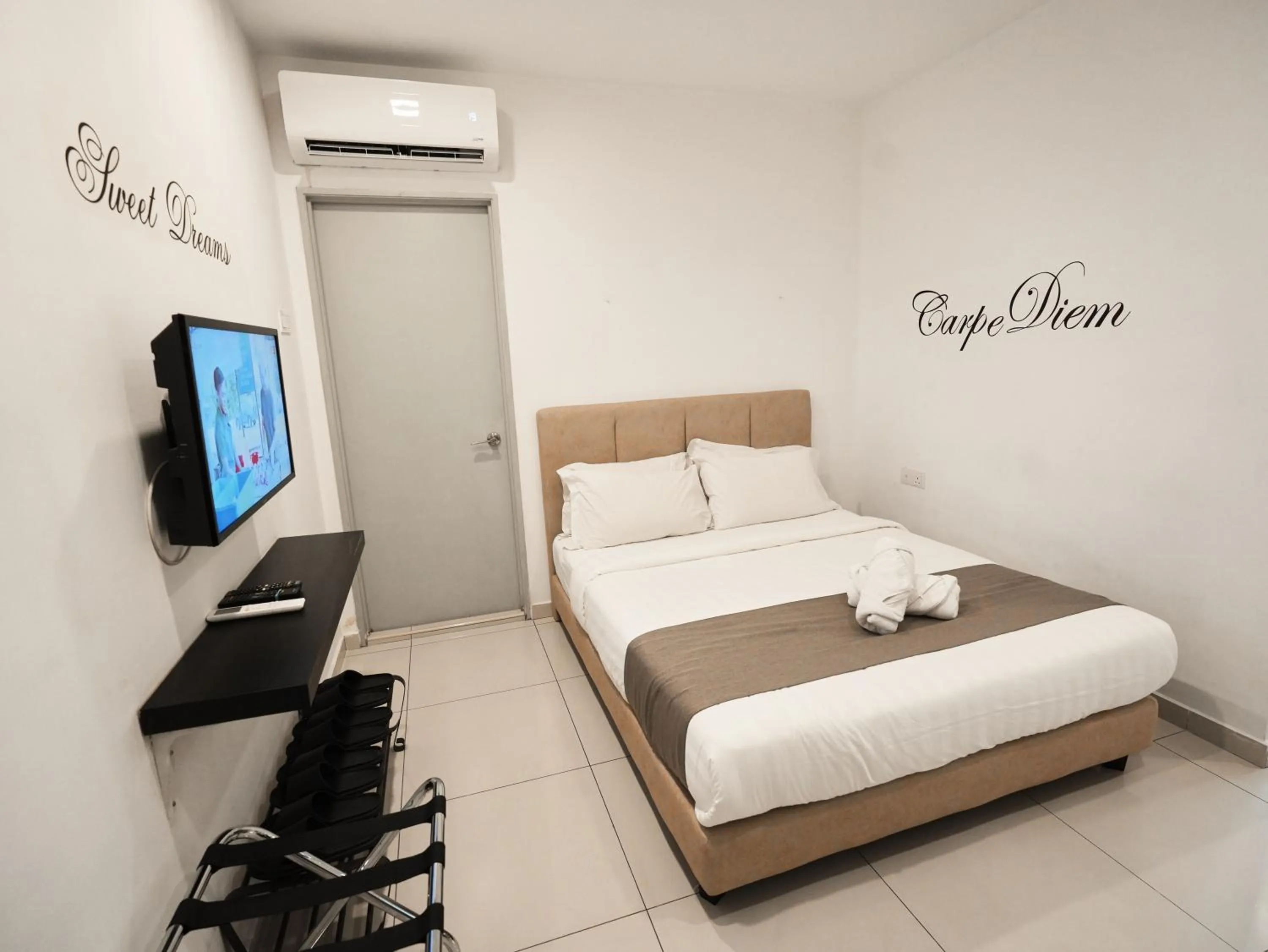 Bed in Eco Roomy Hotel