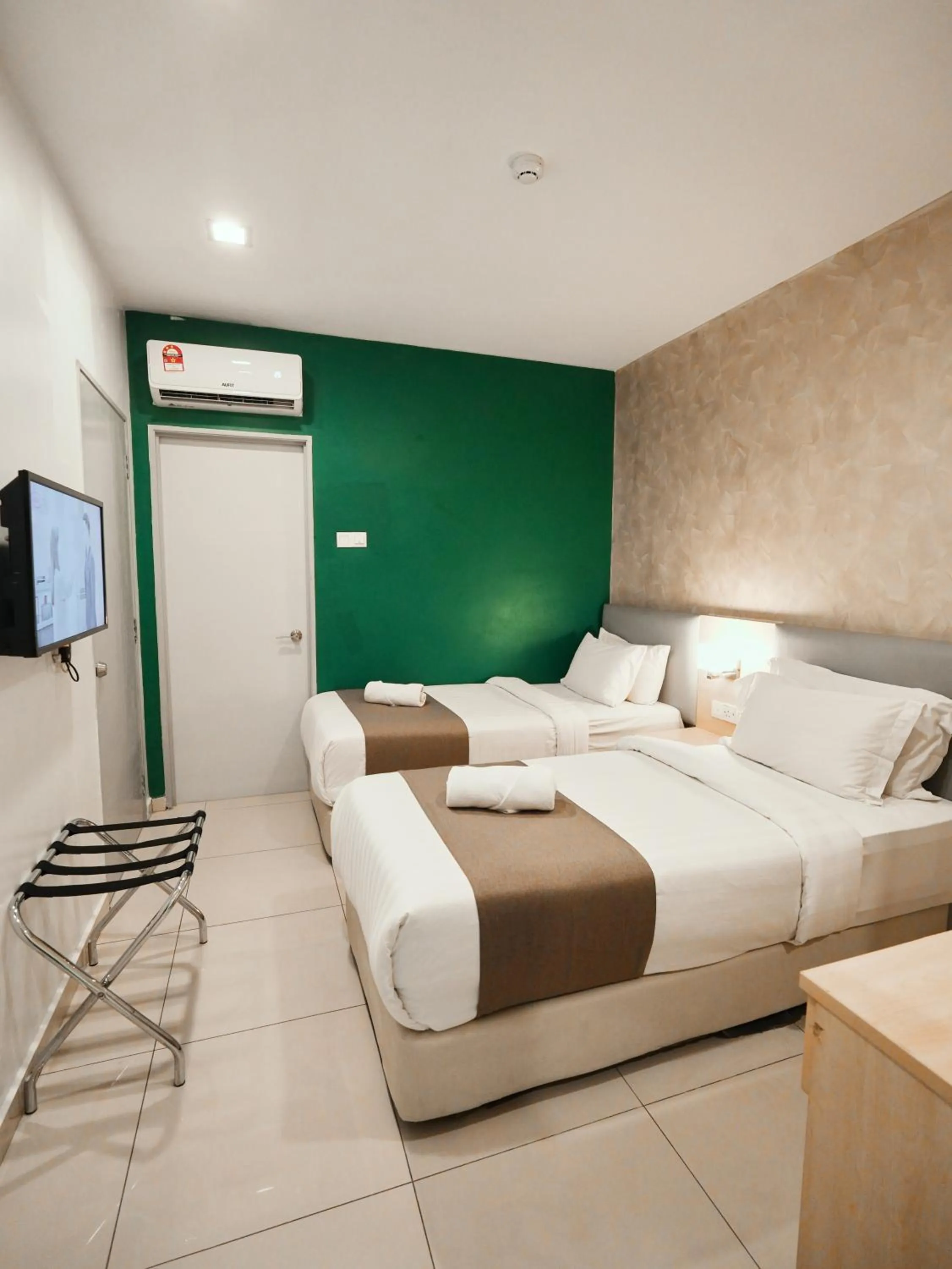 Bed in Eco Roomy Hotel