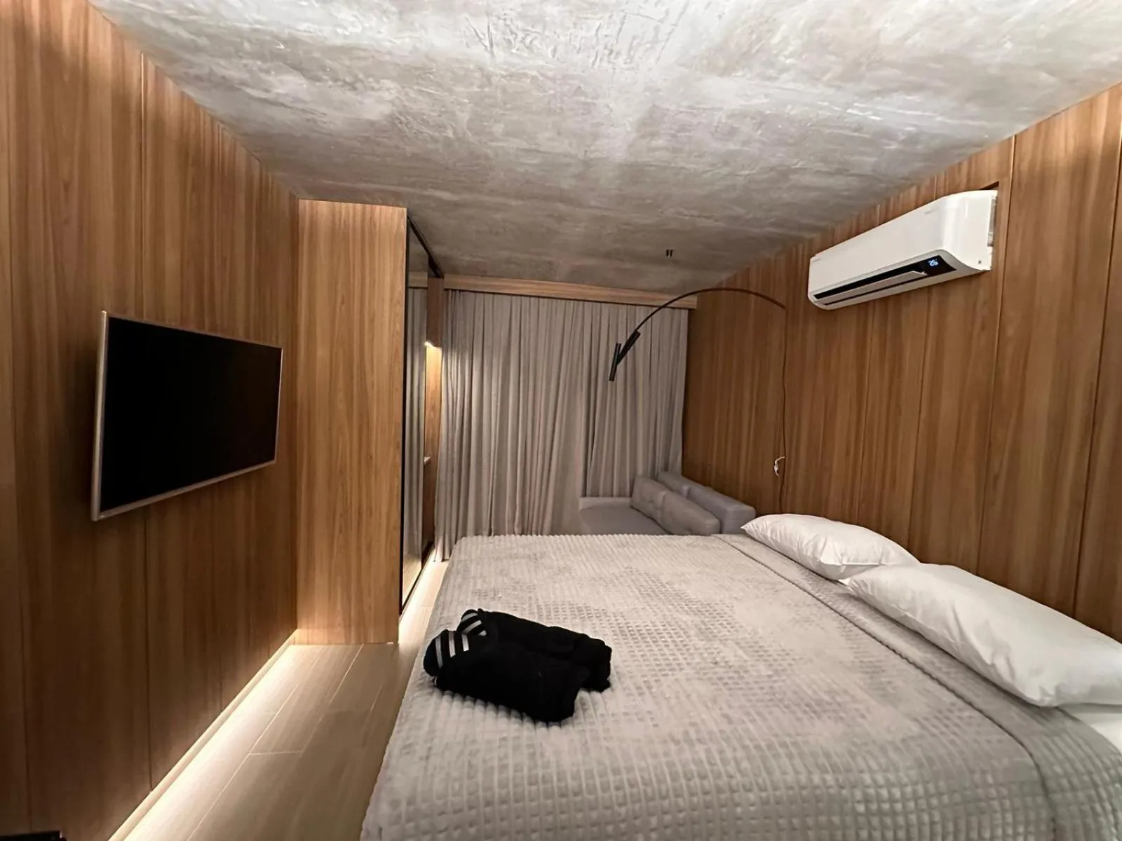 Bed in Setai Yacht Apart Hotel by lesuites