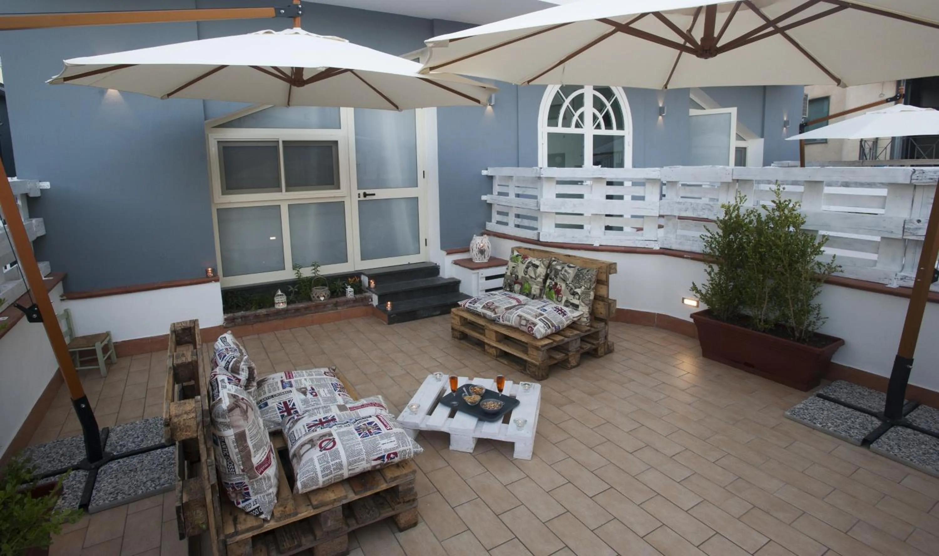 Patio in City Pompei Accommodations