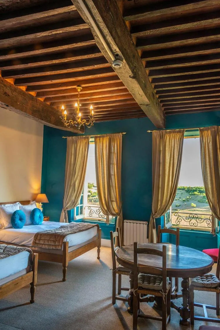 Bed in Hotel Raymond VII