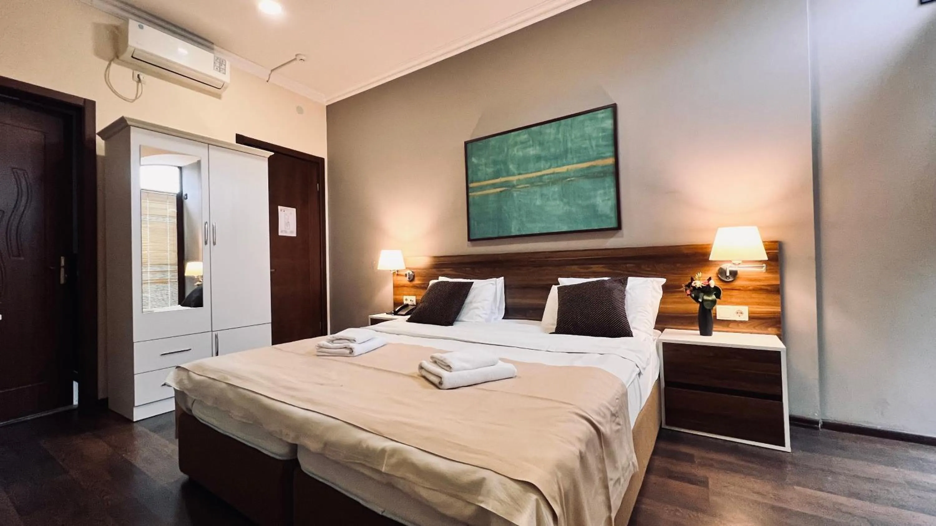 Bed in Point Hotel Tbilisi